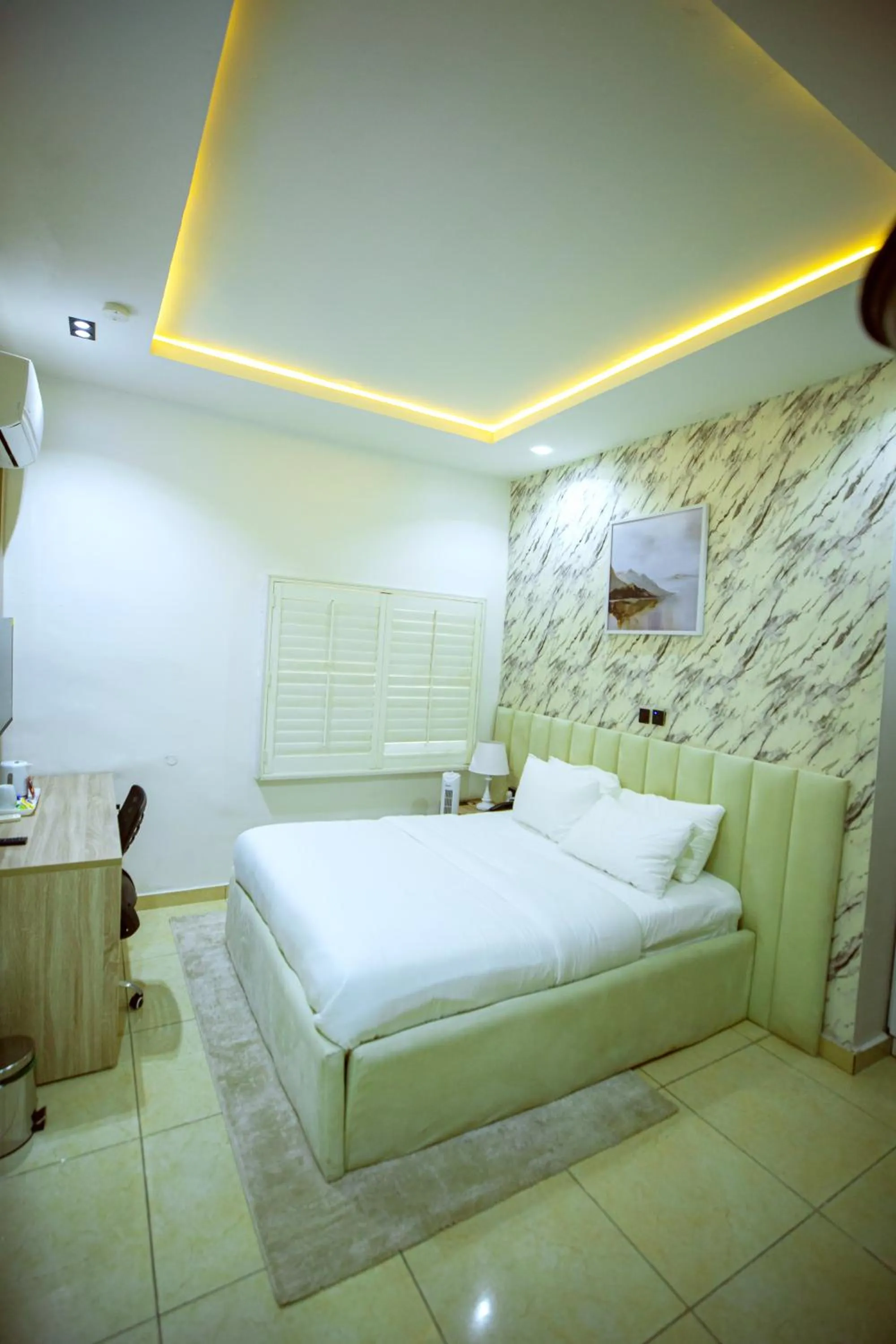 Bed in Tranquil Oasis Hotel