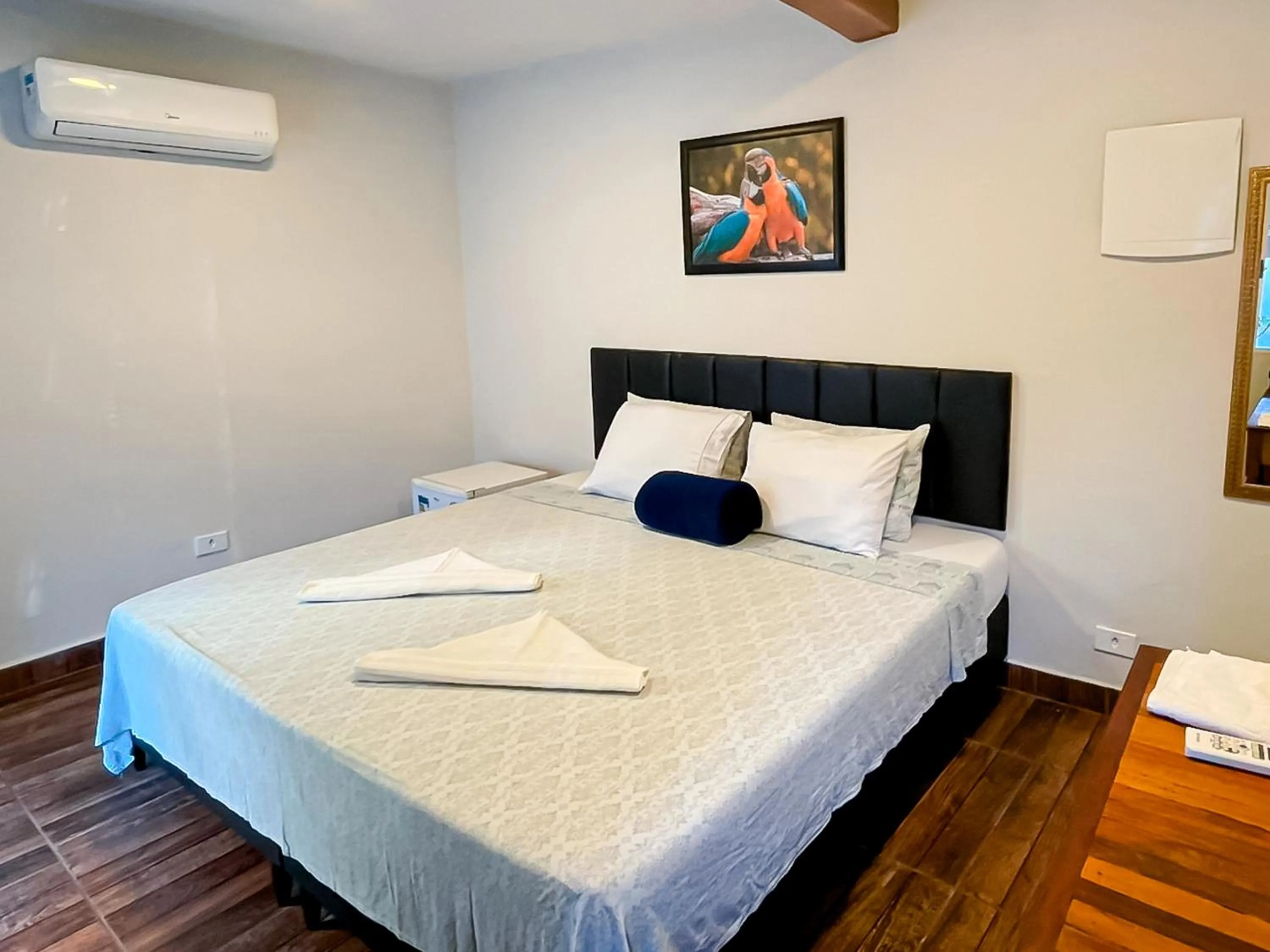 Bed in VELINN Pousada Praia do Perequê