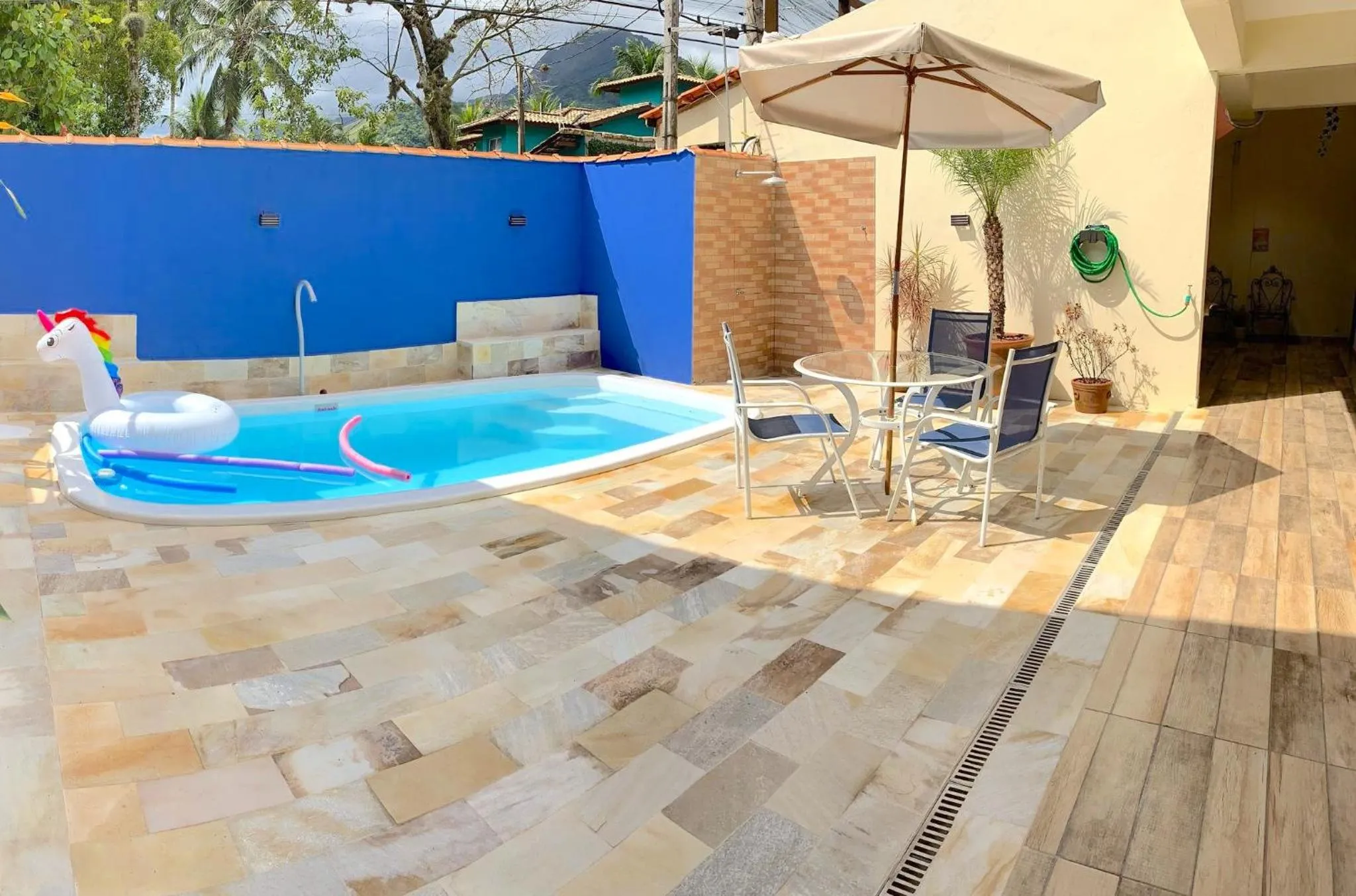 Swimming pool in VELINN Pousada Praia do Perequê