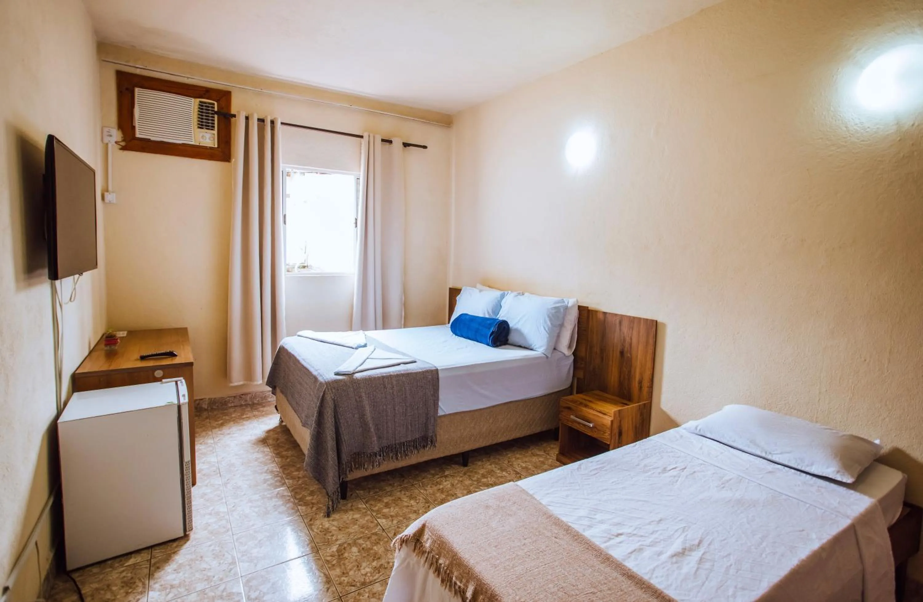 Bed in VELINN Pousada Praia do Perequê