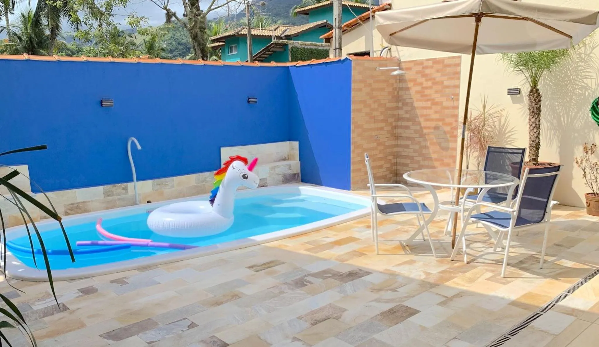 Swimming pool in VELINN Pousada Praia do Perequê