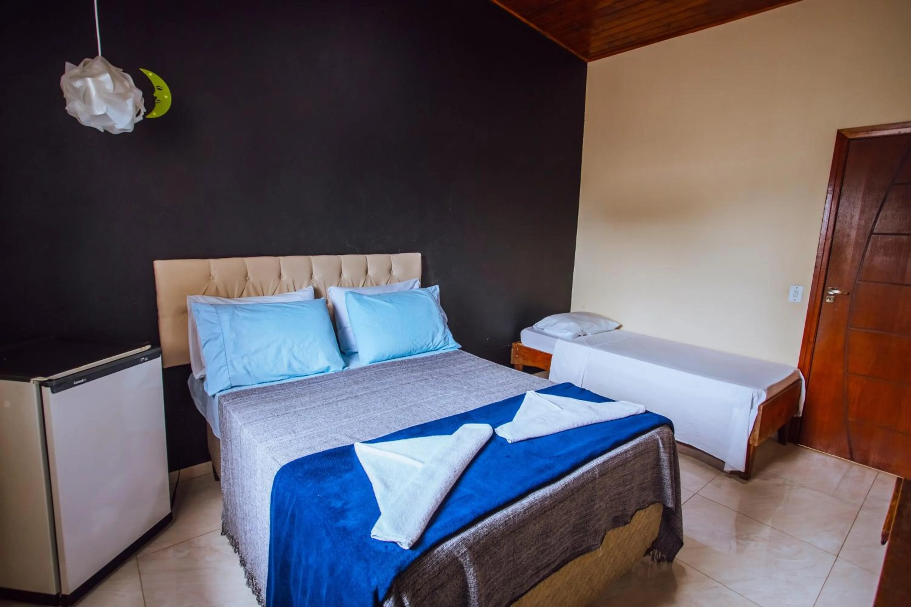 Bed in VELINN Pousada Praia do Perequê