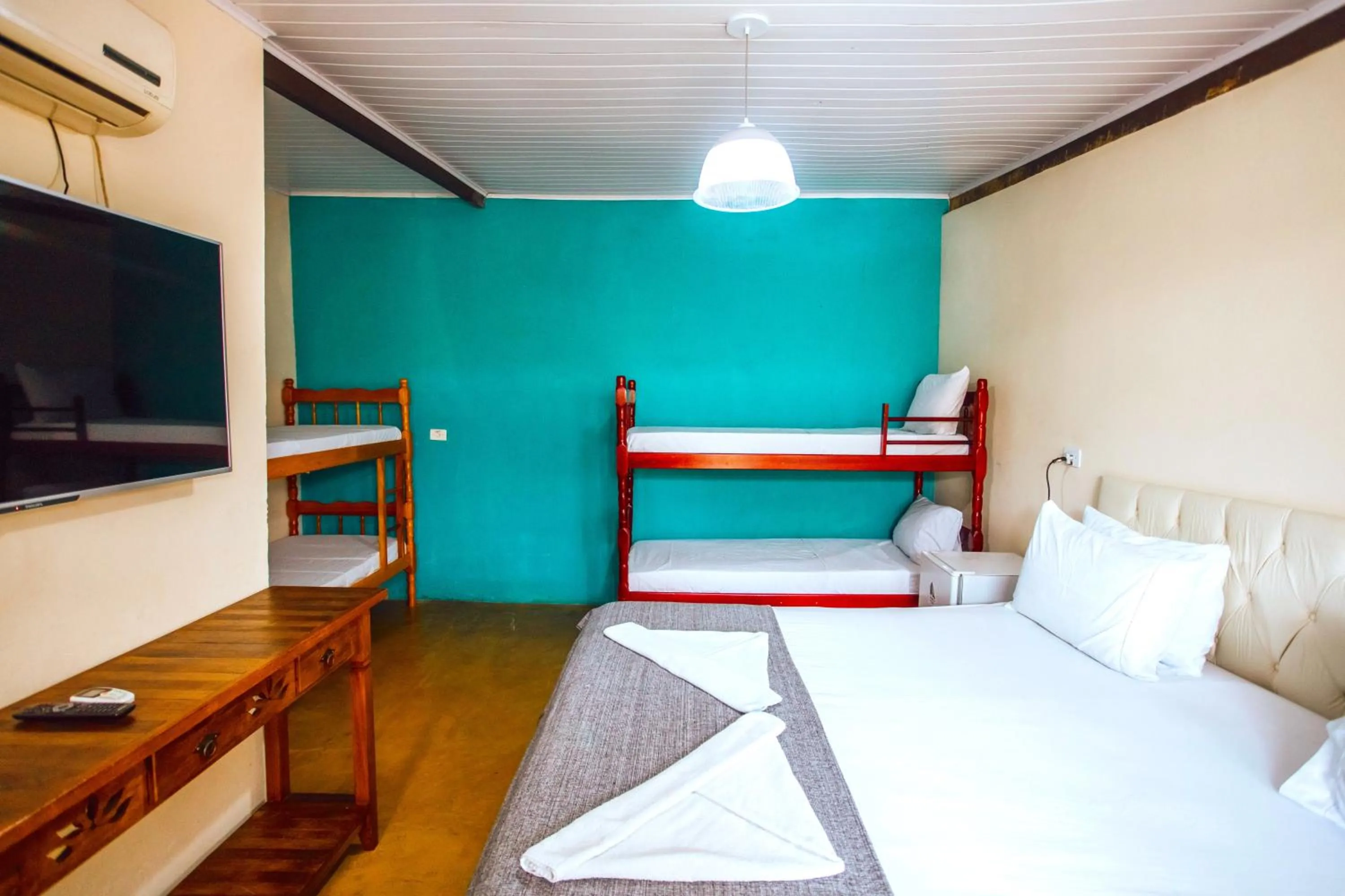 Bed in VELINN Pousada Praia do Perequê