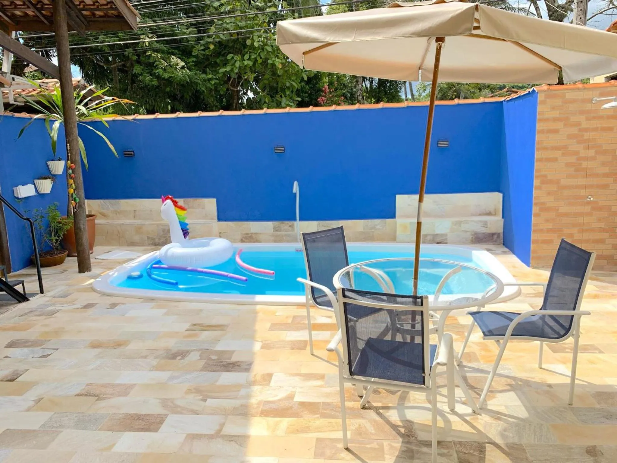 Swimming pool in VELINN Pousada Praia do Perequê