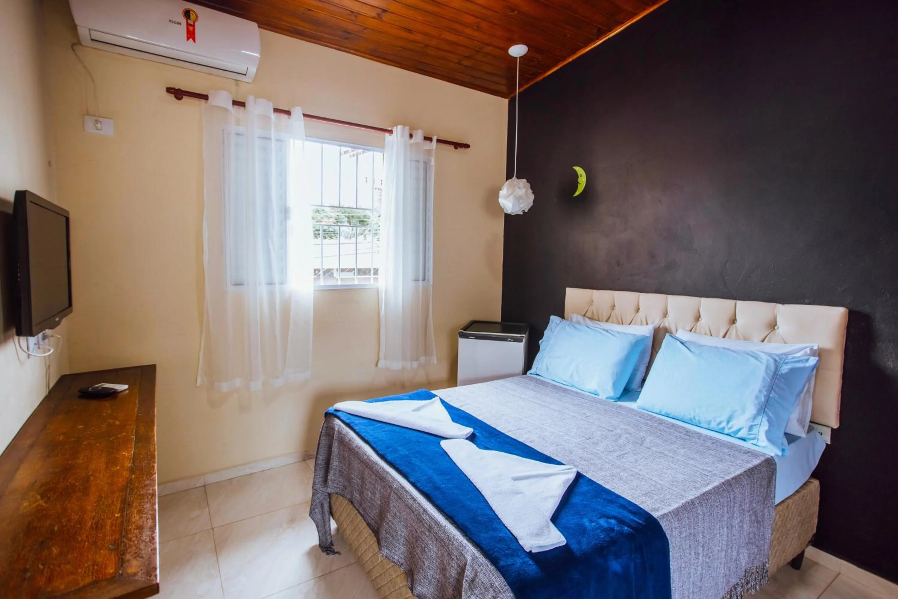 Bed in VELINN Pousada Praia do Perequê