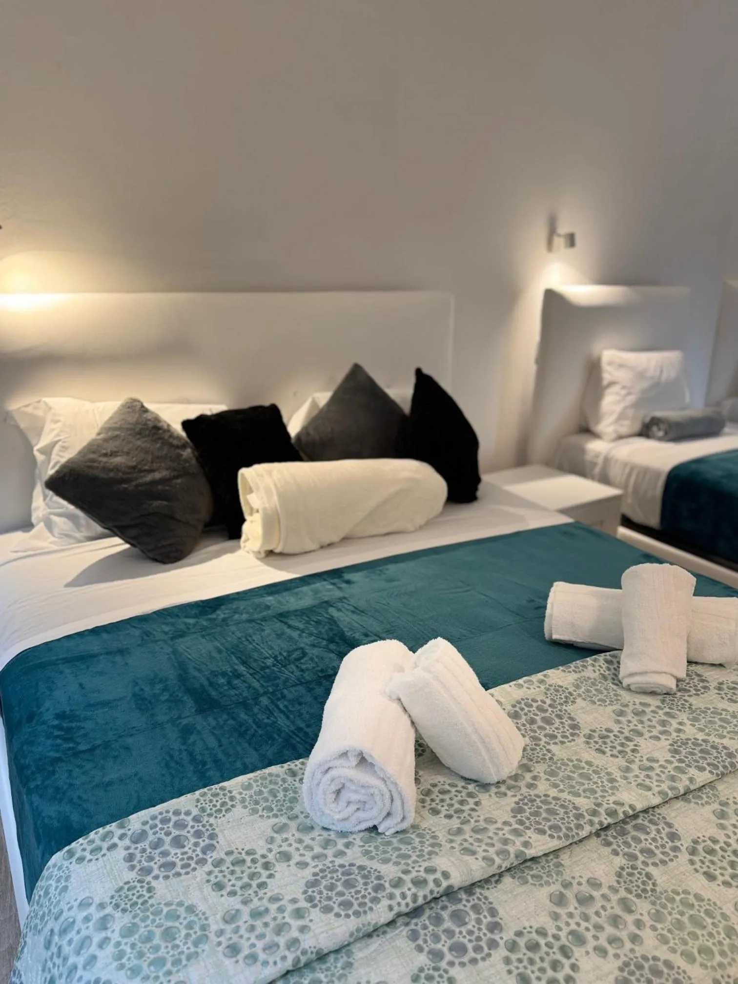 towels, Bed in Albergo Tenco by Bottega