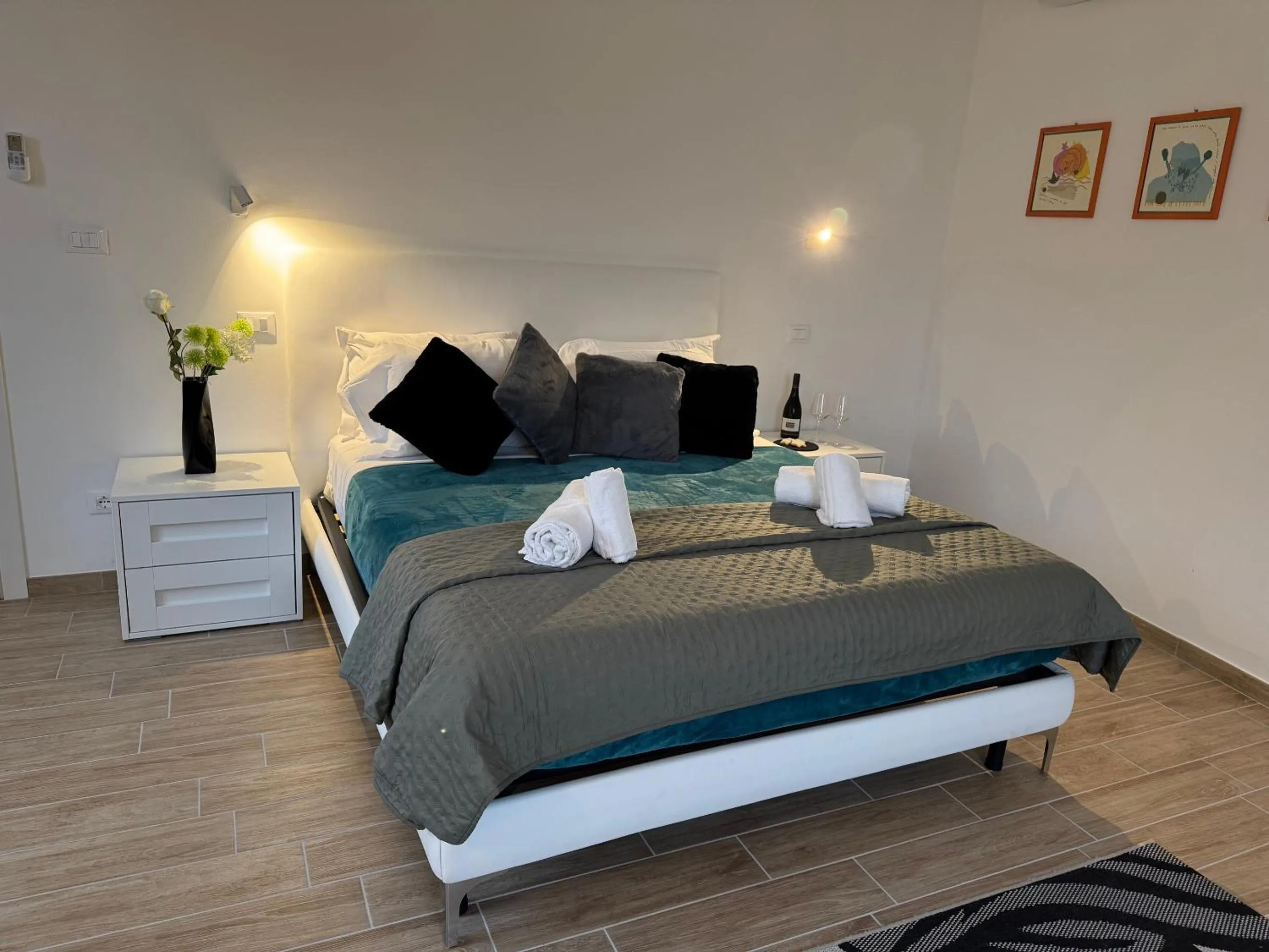 Bed in Albergo Tenco by Bottega