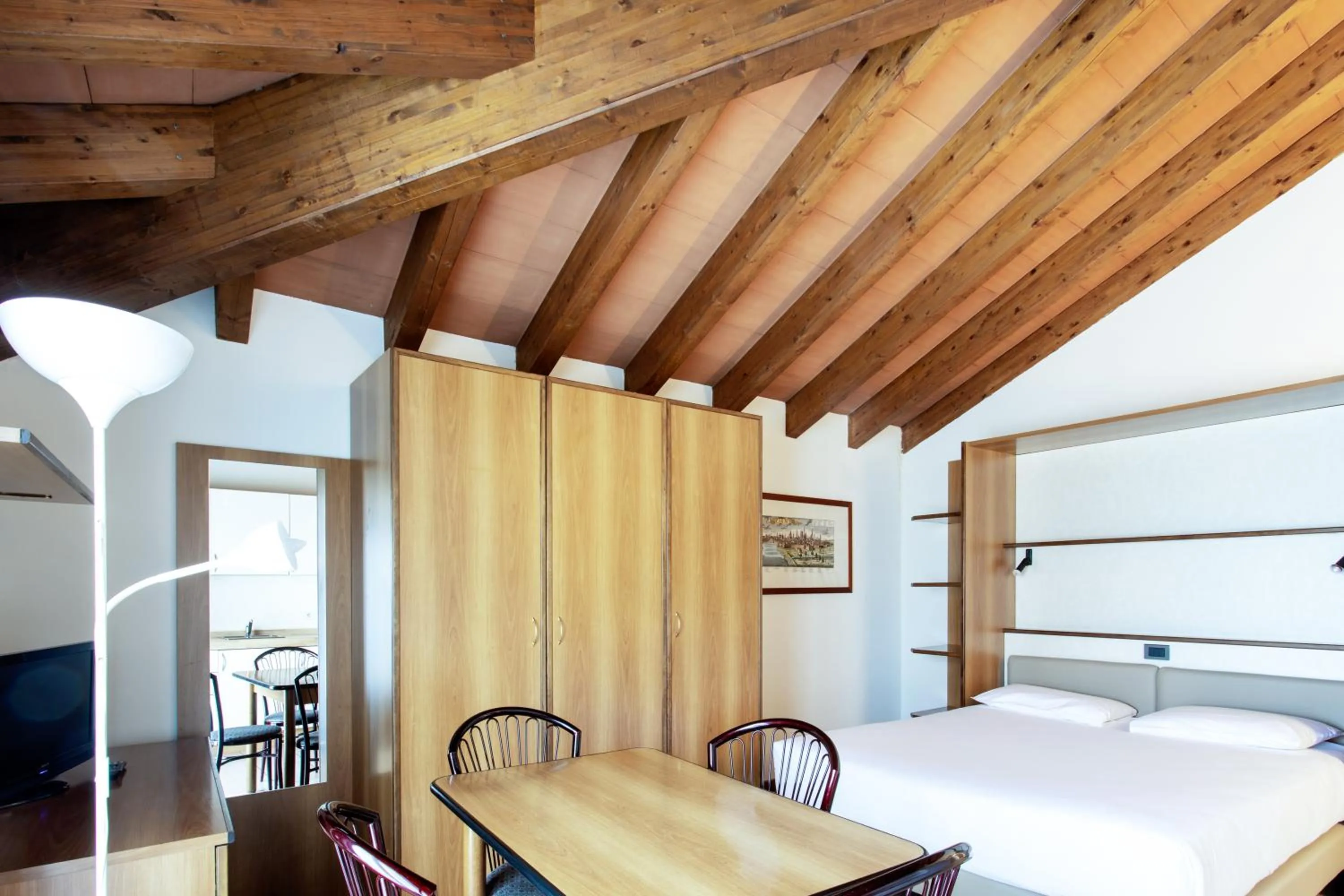 Living room, Bed in Residenza Le Cupole