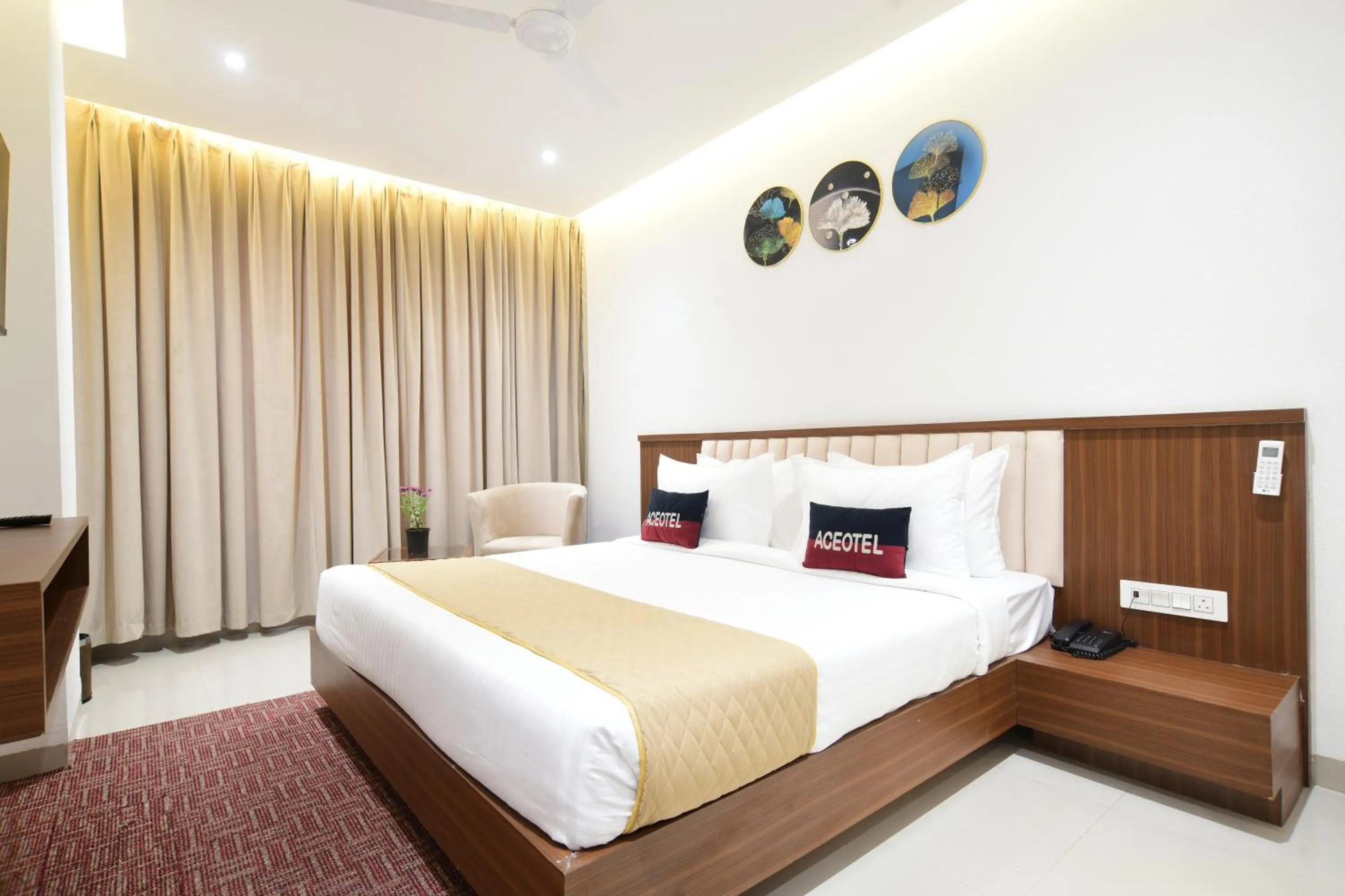 Bed in Aceotel Premier, Vijay Nagar