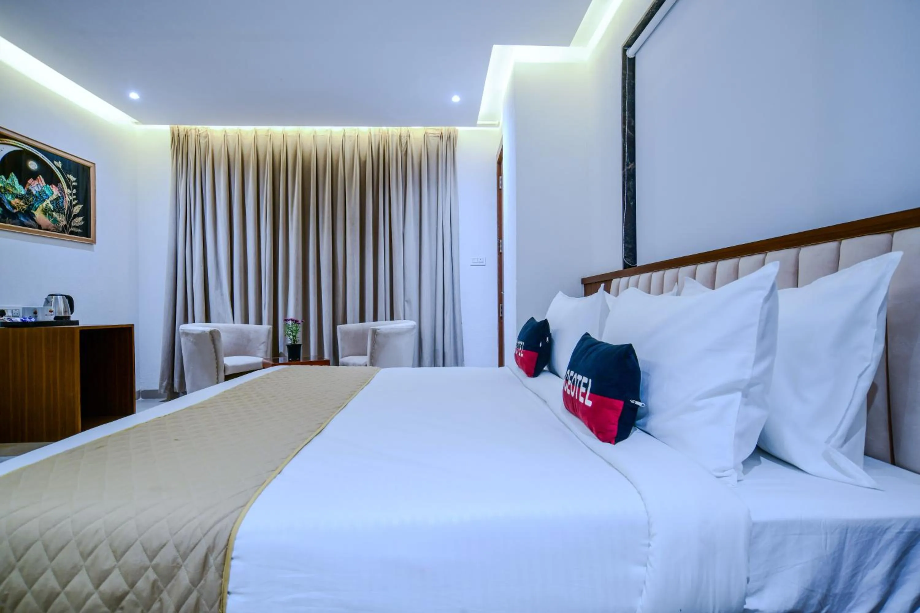 Bed in Aceotel Premier, Vijay Nagar
