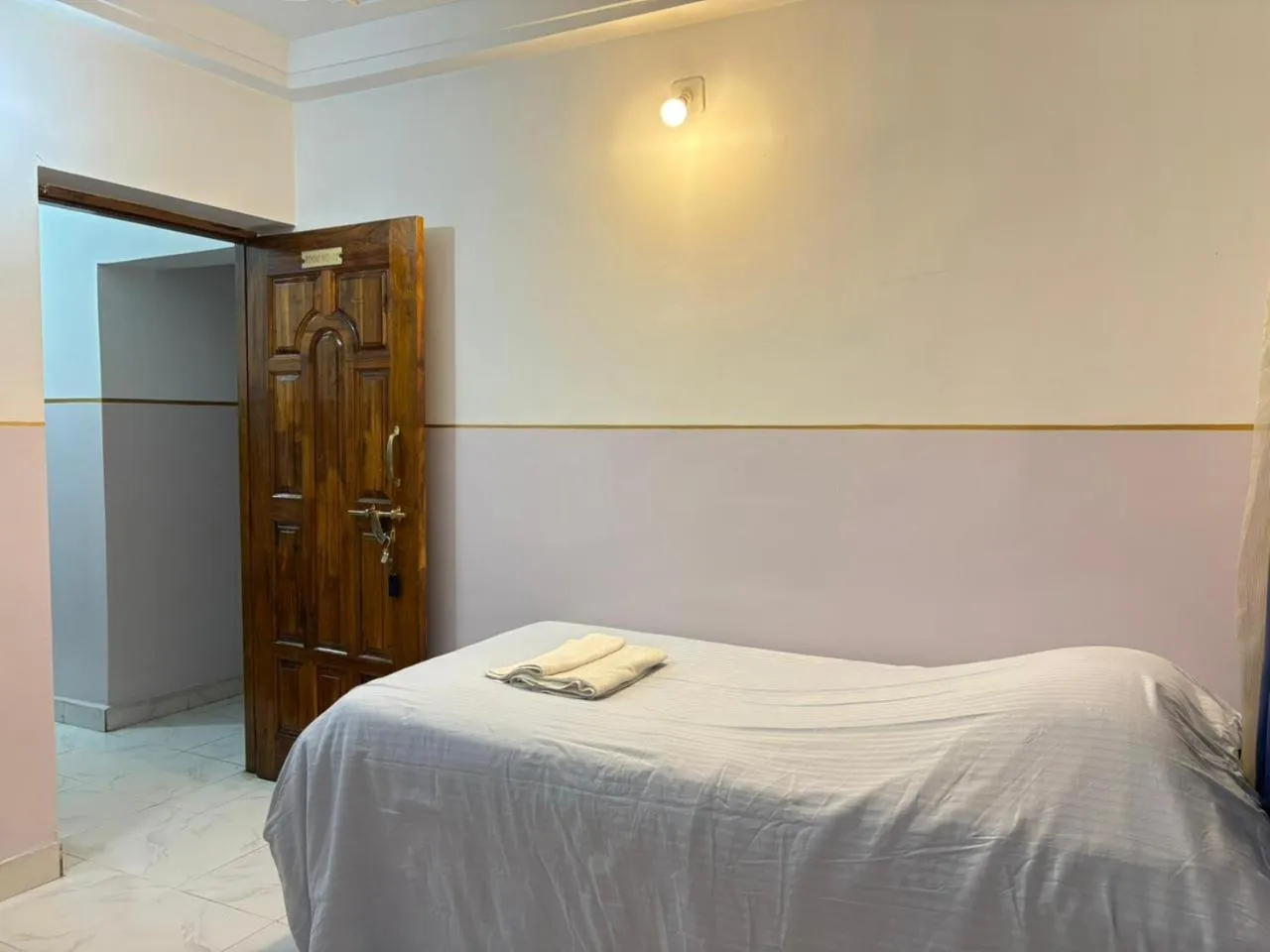 Property building, Bed in Tara Guest House