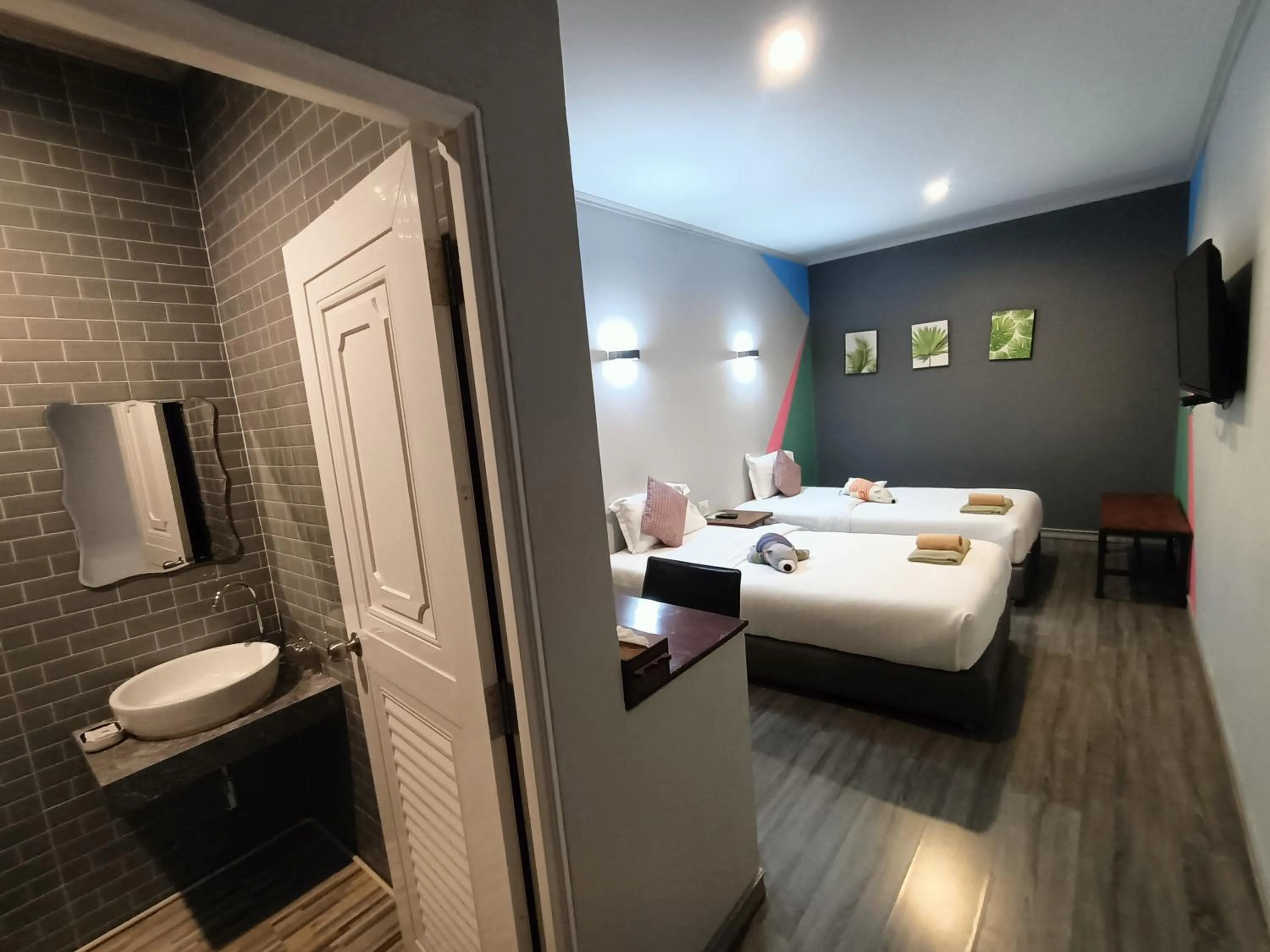 Bed in Aen Guy Boutique Hotel