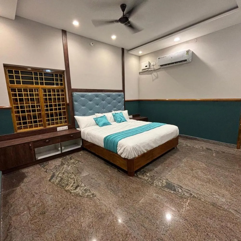 Photo of the whole room, Bed in Jaithri Hotel and Event Centre