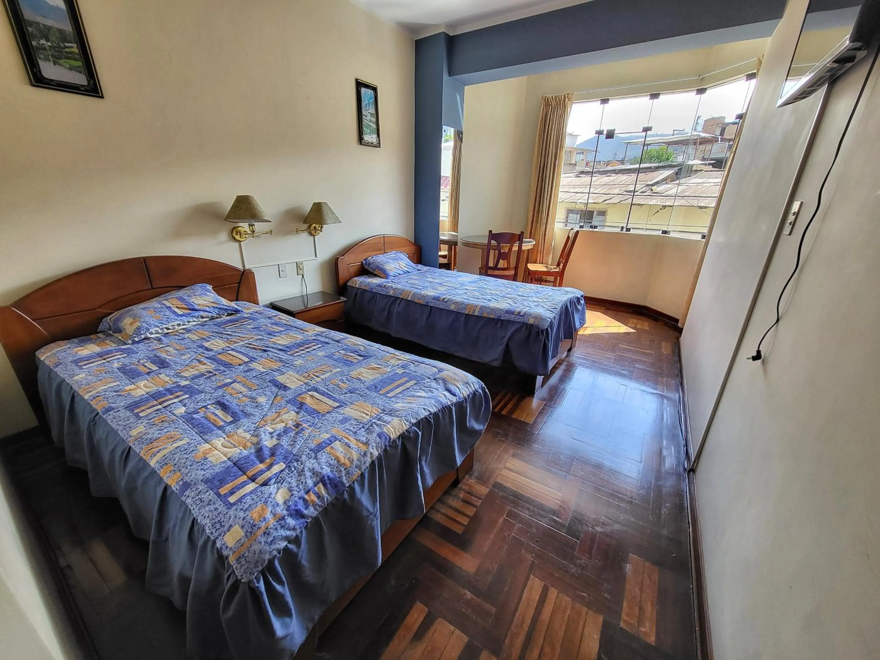 Bed in D'Cardenas Hotel