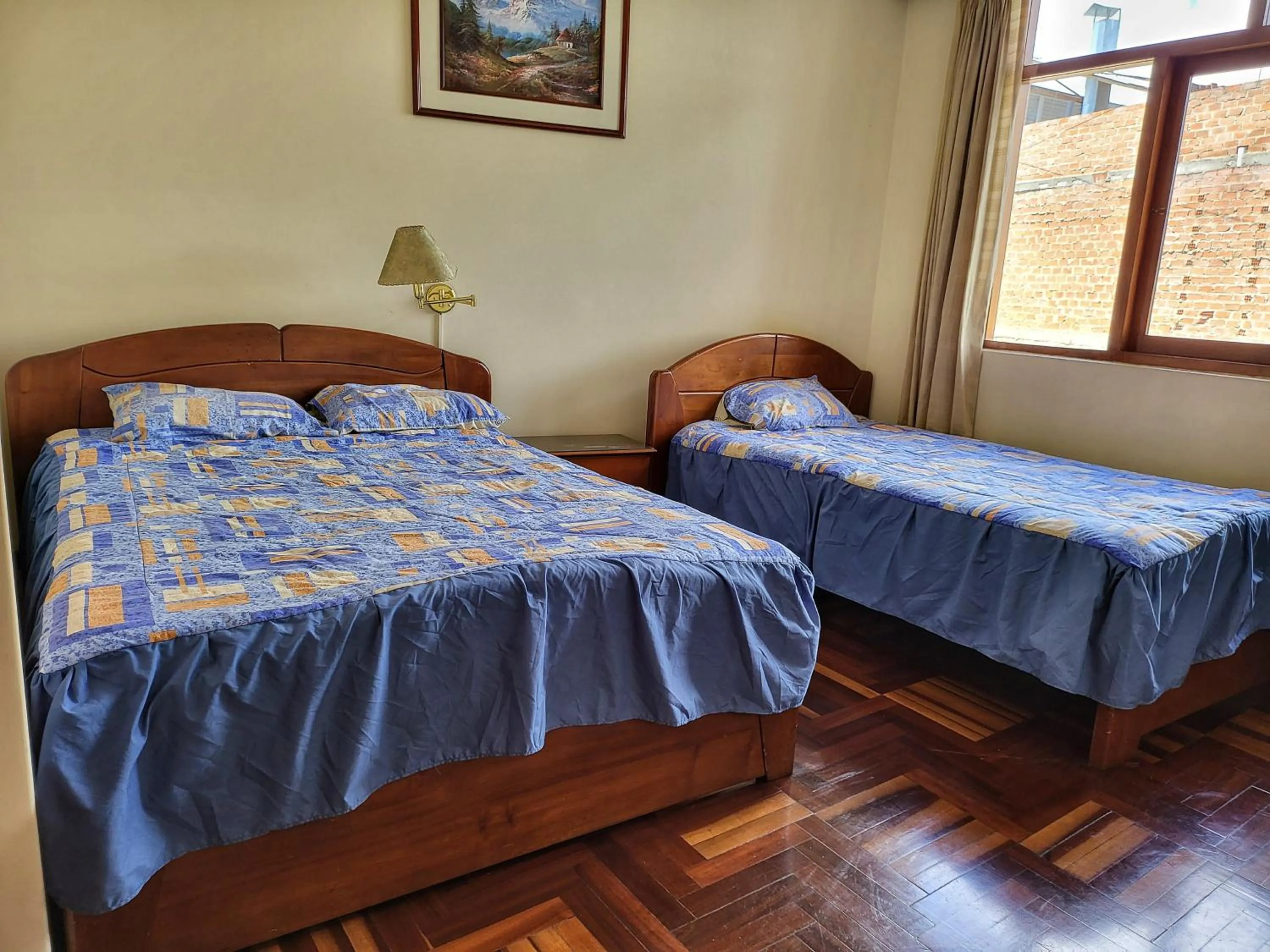 Bed in D'Cardenas Hotel