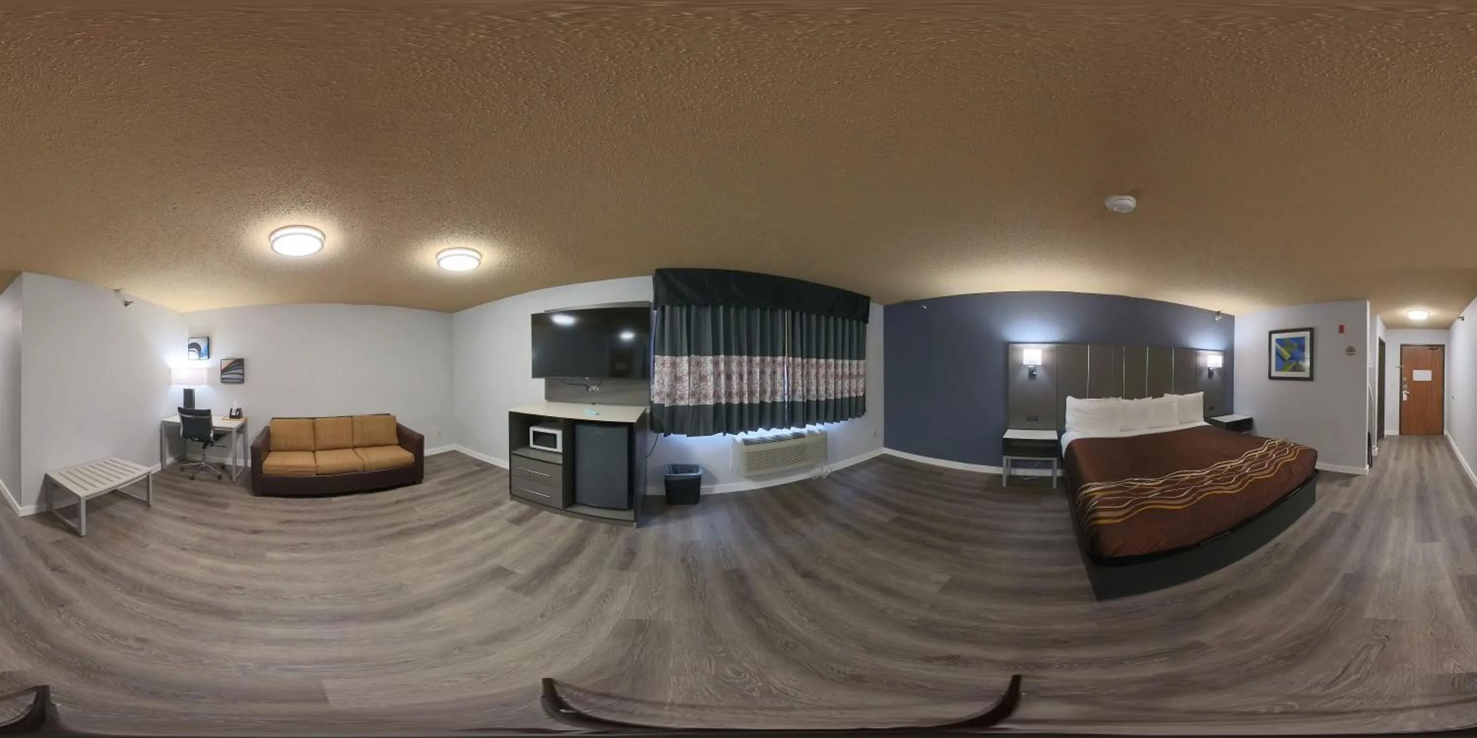 Bedroom in Coratel Inn and Suites By Jasper Eagan ST Paul Airport & Mall of America