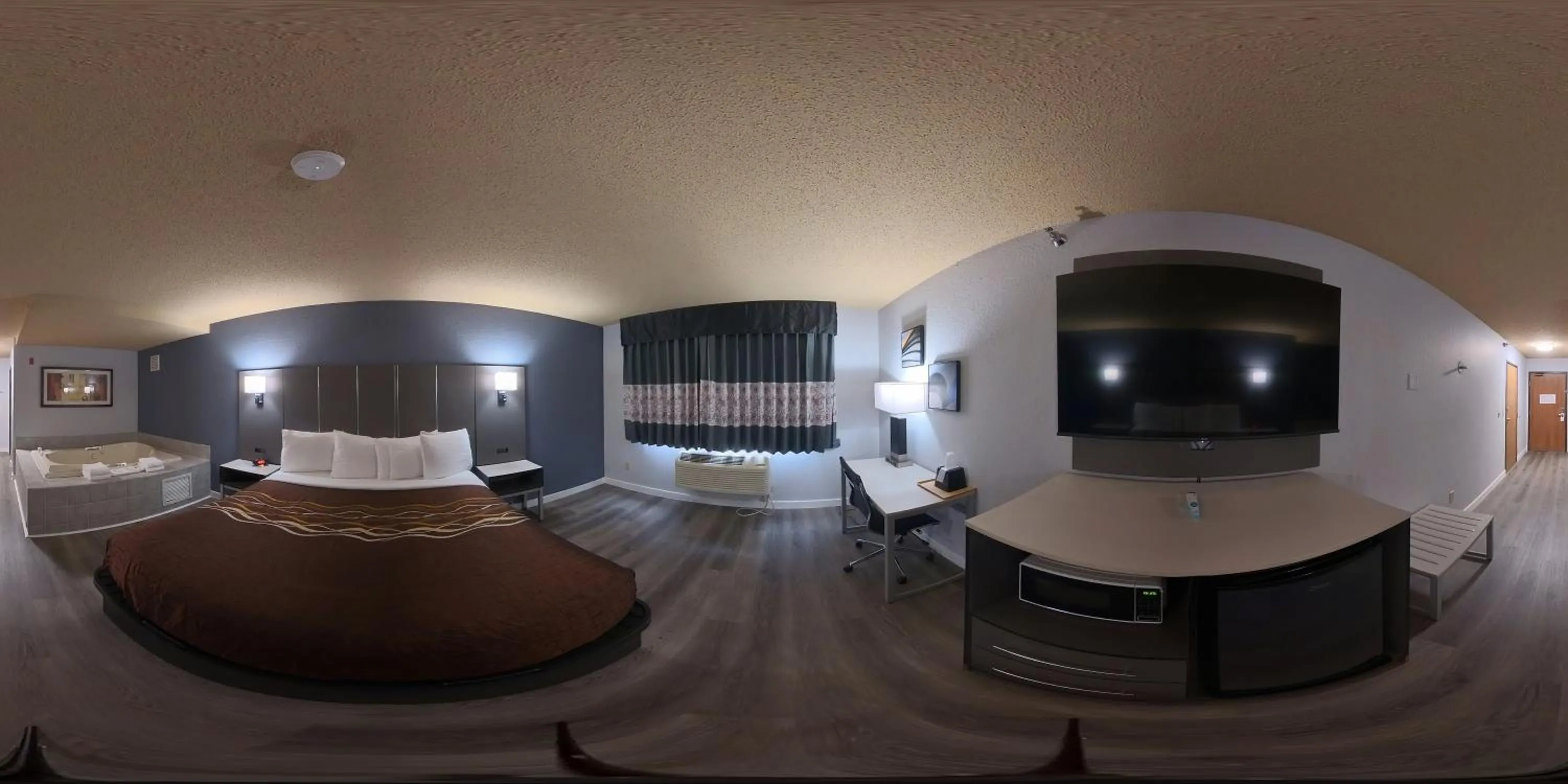 Bedroom in Coratel Inn and Suites By Jasper Eagan ST Paul Airport & Mall of America