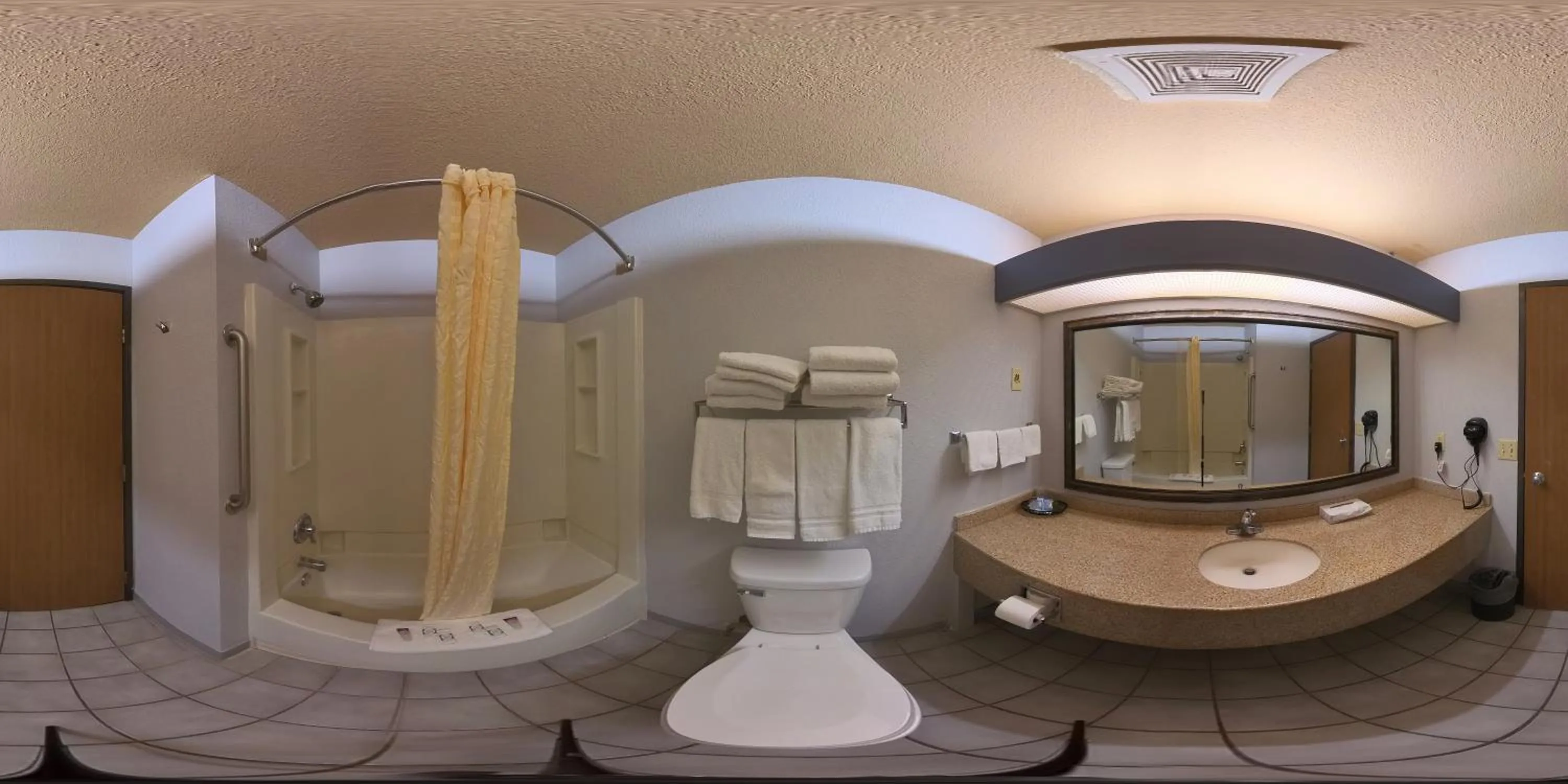 Bathroom in Coratel Inn and Suites By Jasper Eagan ST Paul Airport & Mall of America