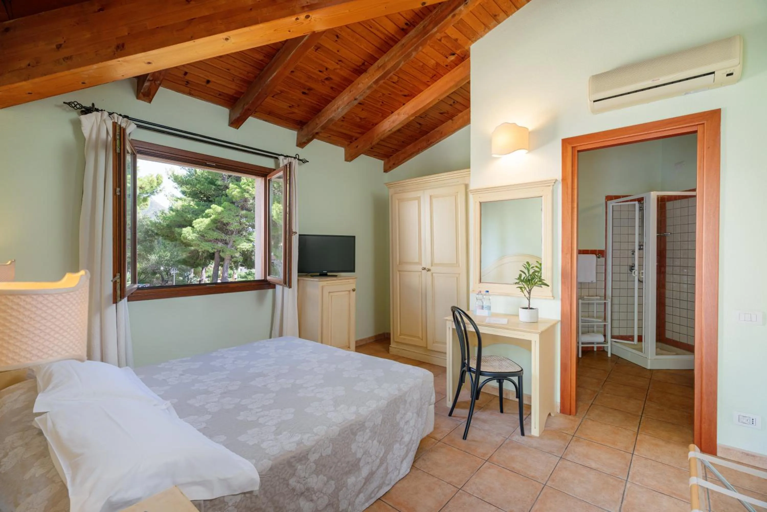 Bedroom, Bed in Club Esse Cala Gonone