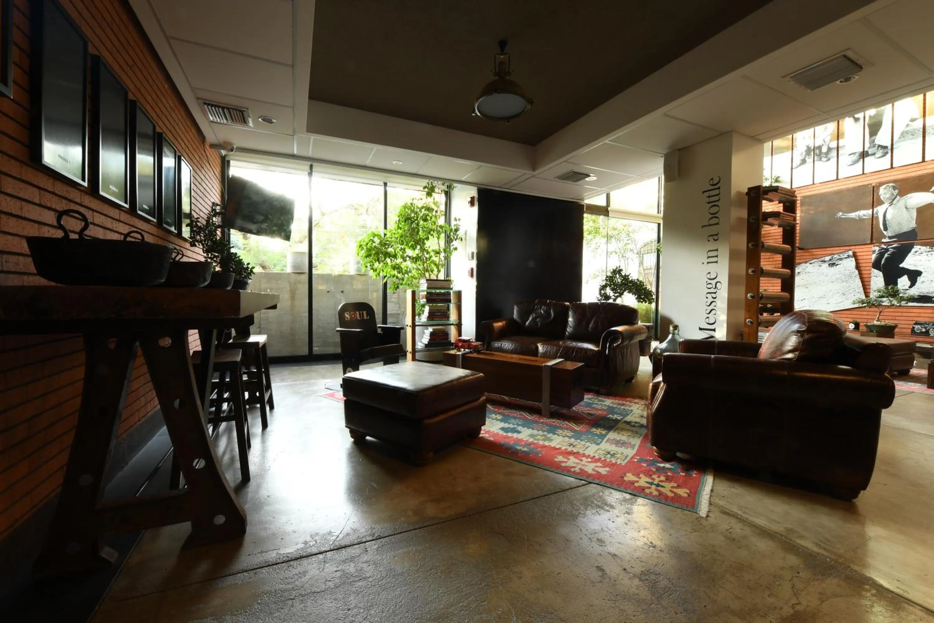 Communal lounge/ TV room in Alfonsina Hotel Boutique