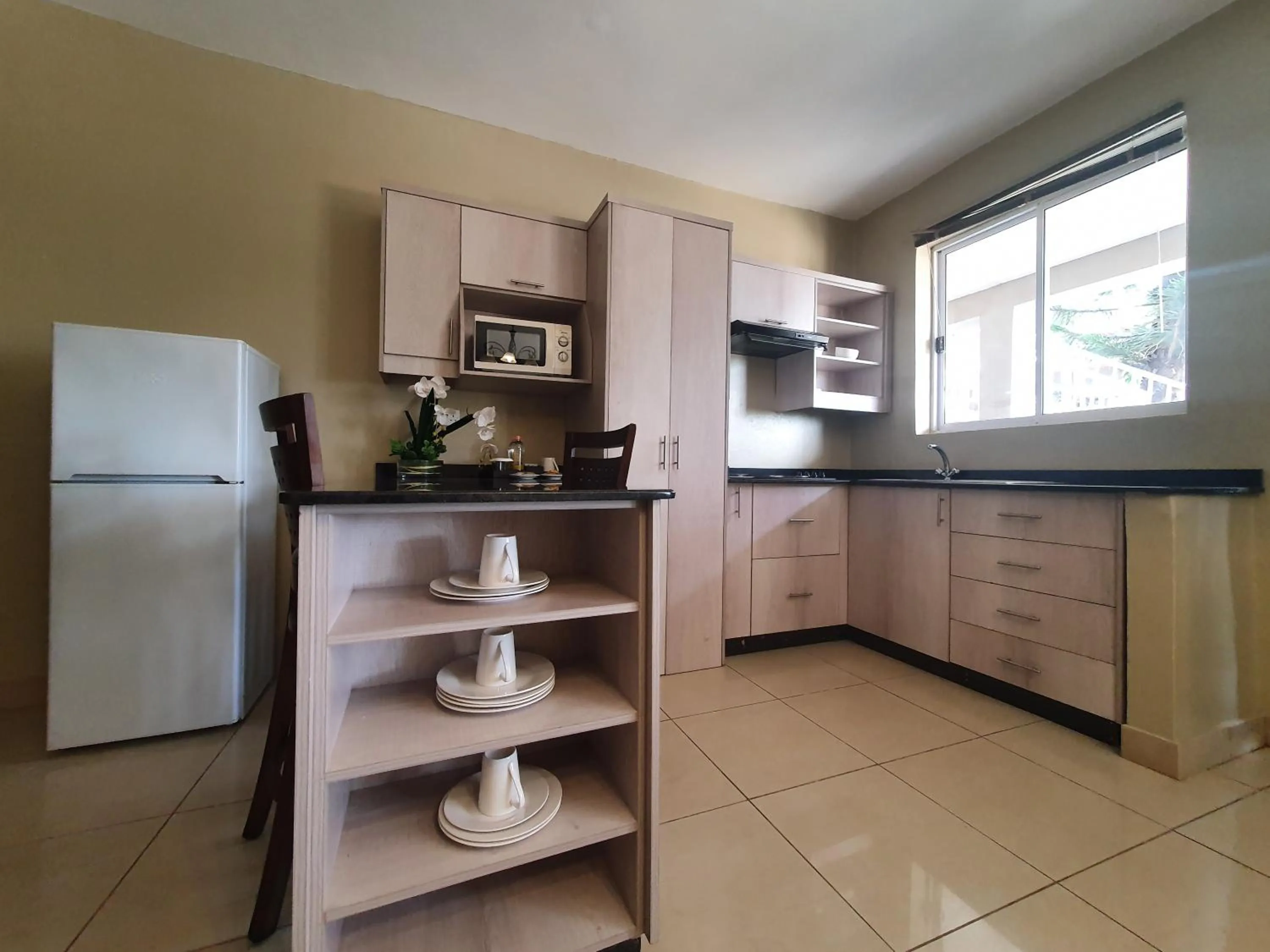 Kitchen or kitchenette in Serendib Suites and Conference Center