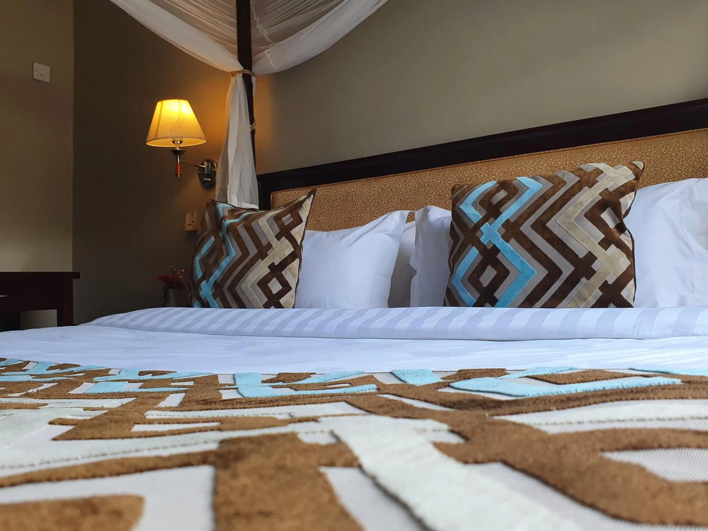 Bedroom, Bed in Serendib Suites and Conference Center