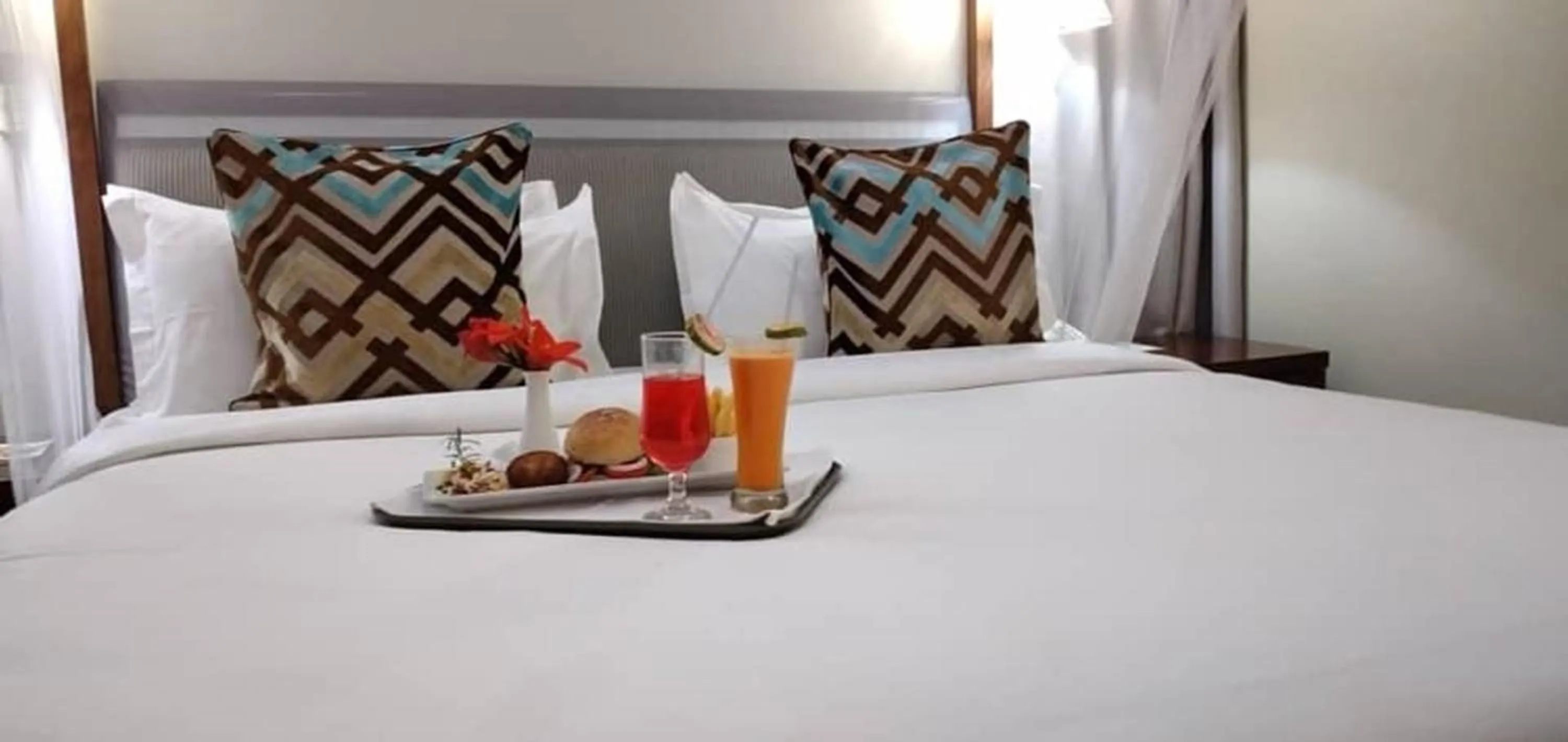 room service, Bed in Serendib Suites and Conference Center