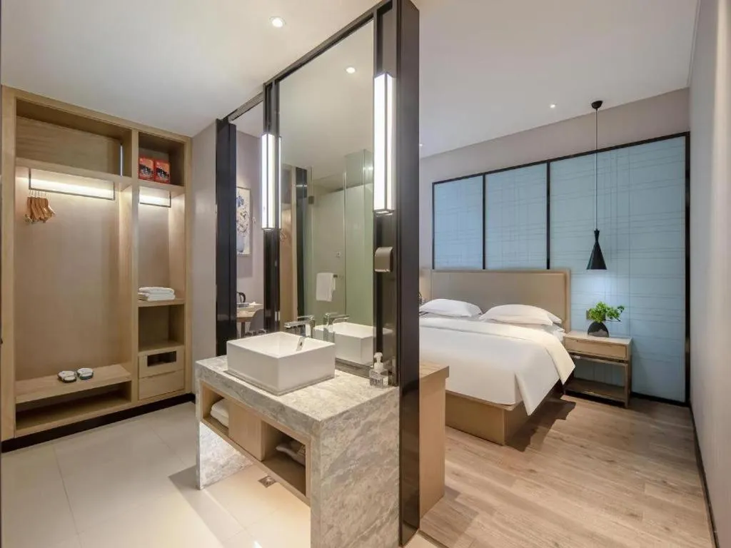 Deluxe Queen Room - single occupancy in Echarm Hotel Baise Sports Center Dream Island Plaza