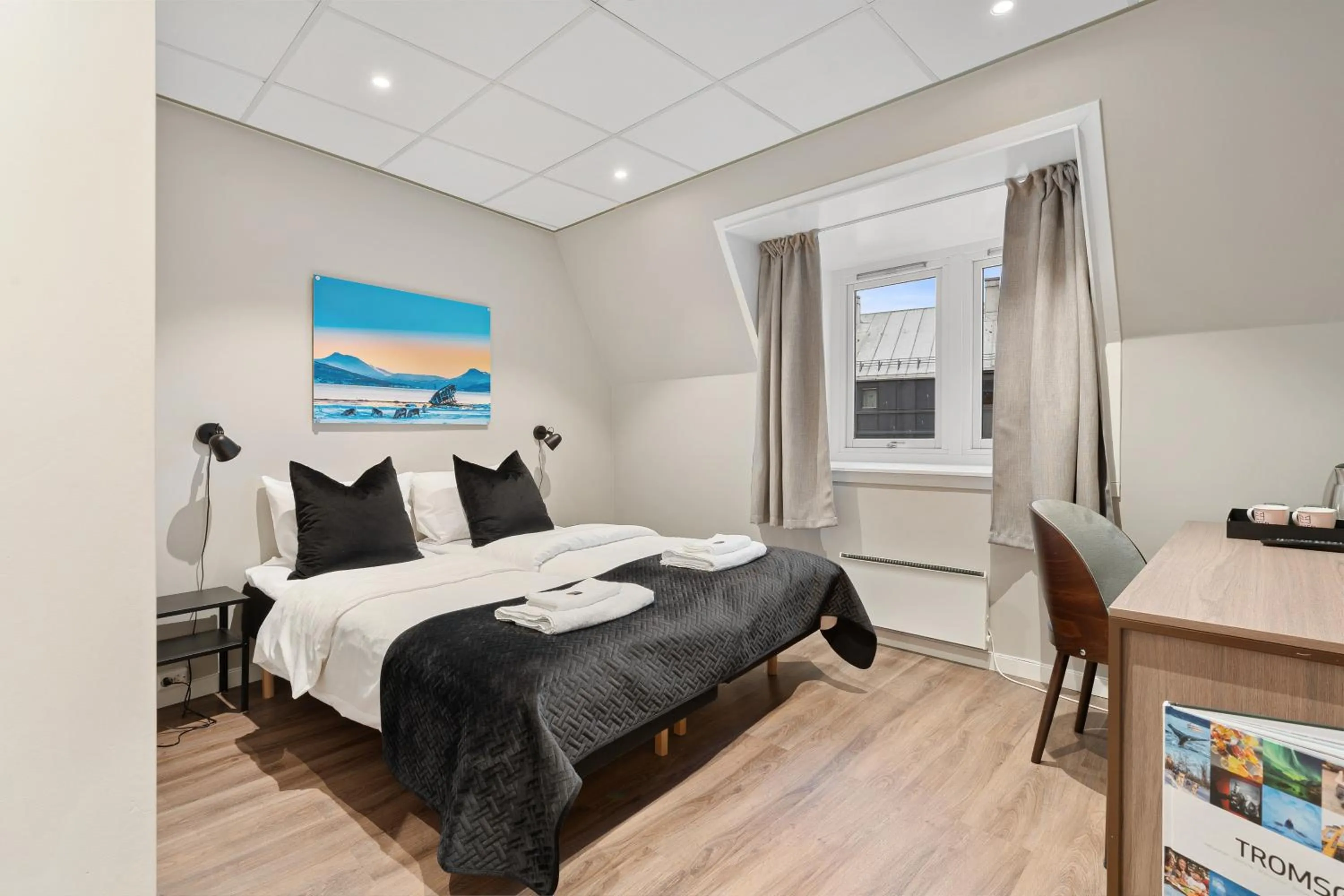 Bed in Enter Skansen Hotel