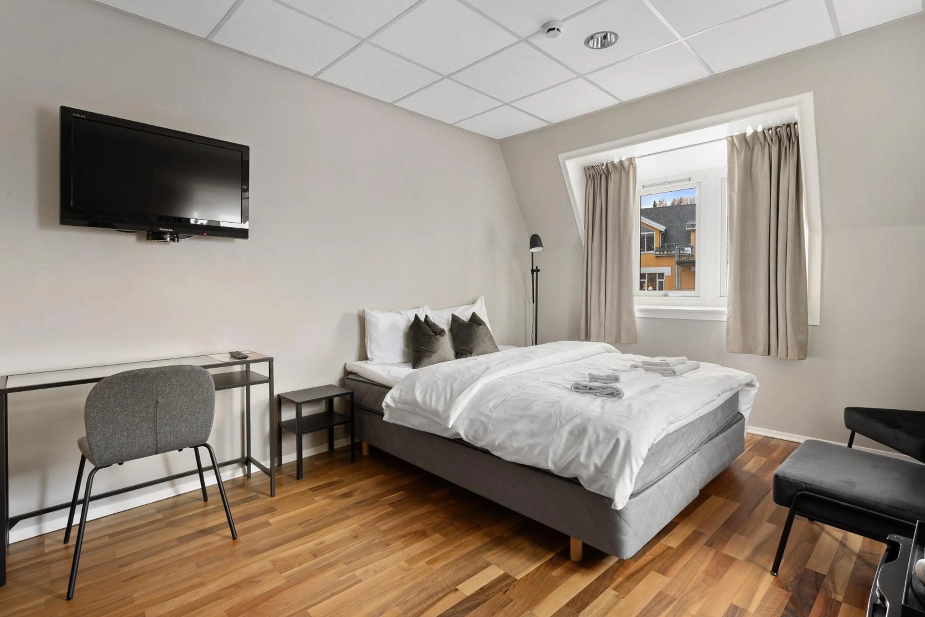 Bed in Enter Skansen Hotel