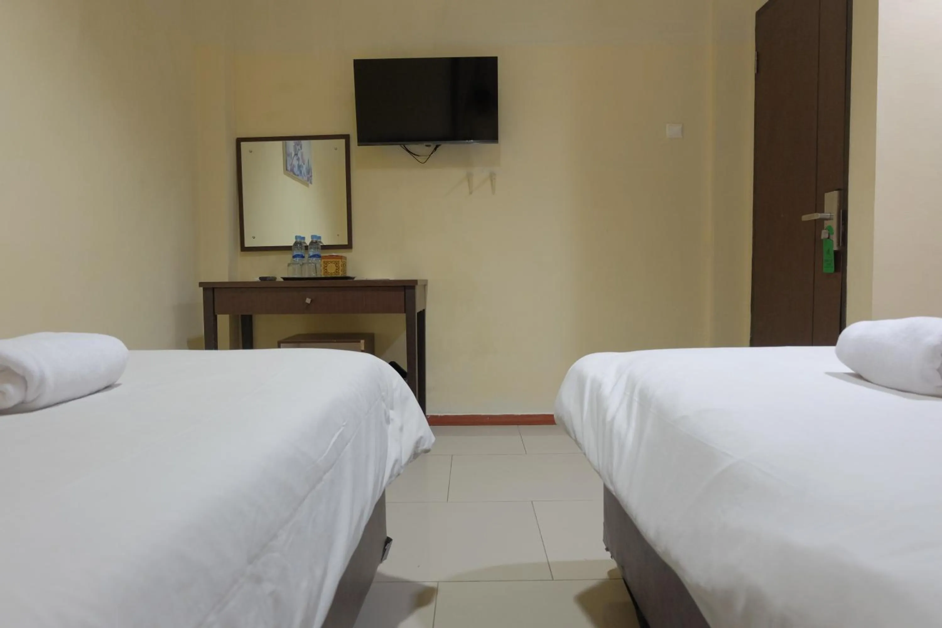 Area and facilities, Bed in De Nusantara Hotel Syariah