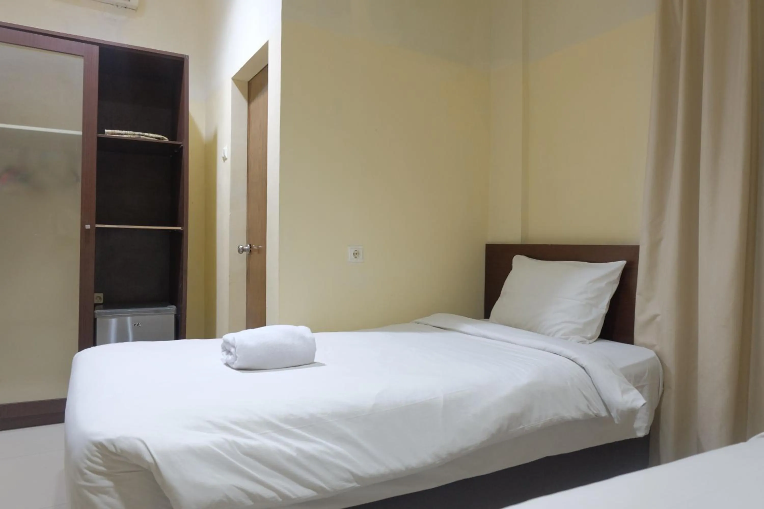 Area and facilities, Bed in De Nusantara Hotel Syariah