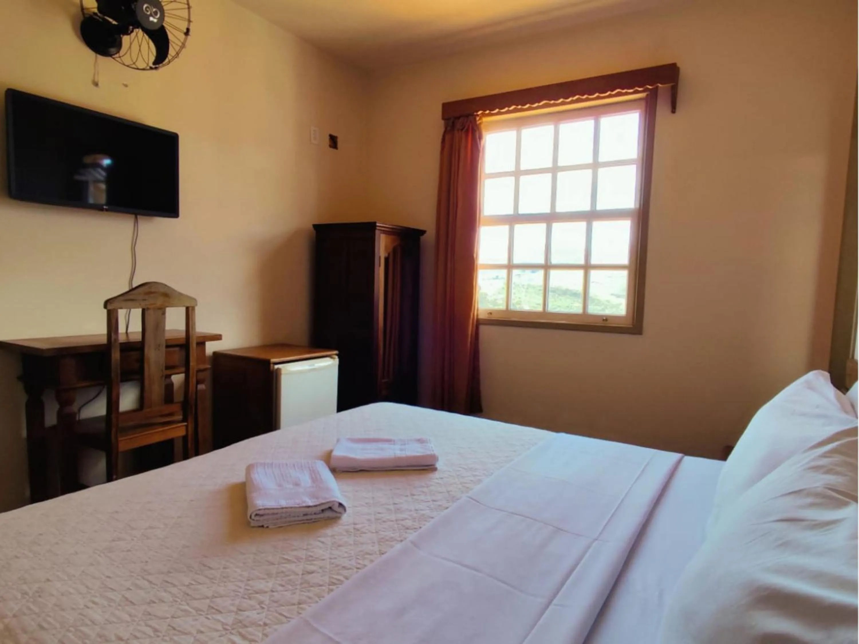 Bed in Pousada Geraes