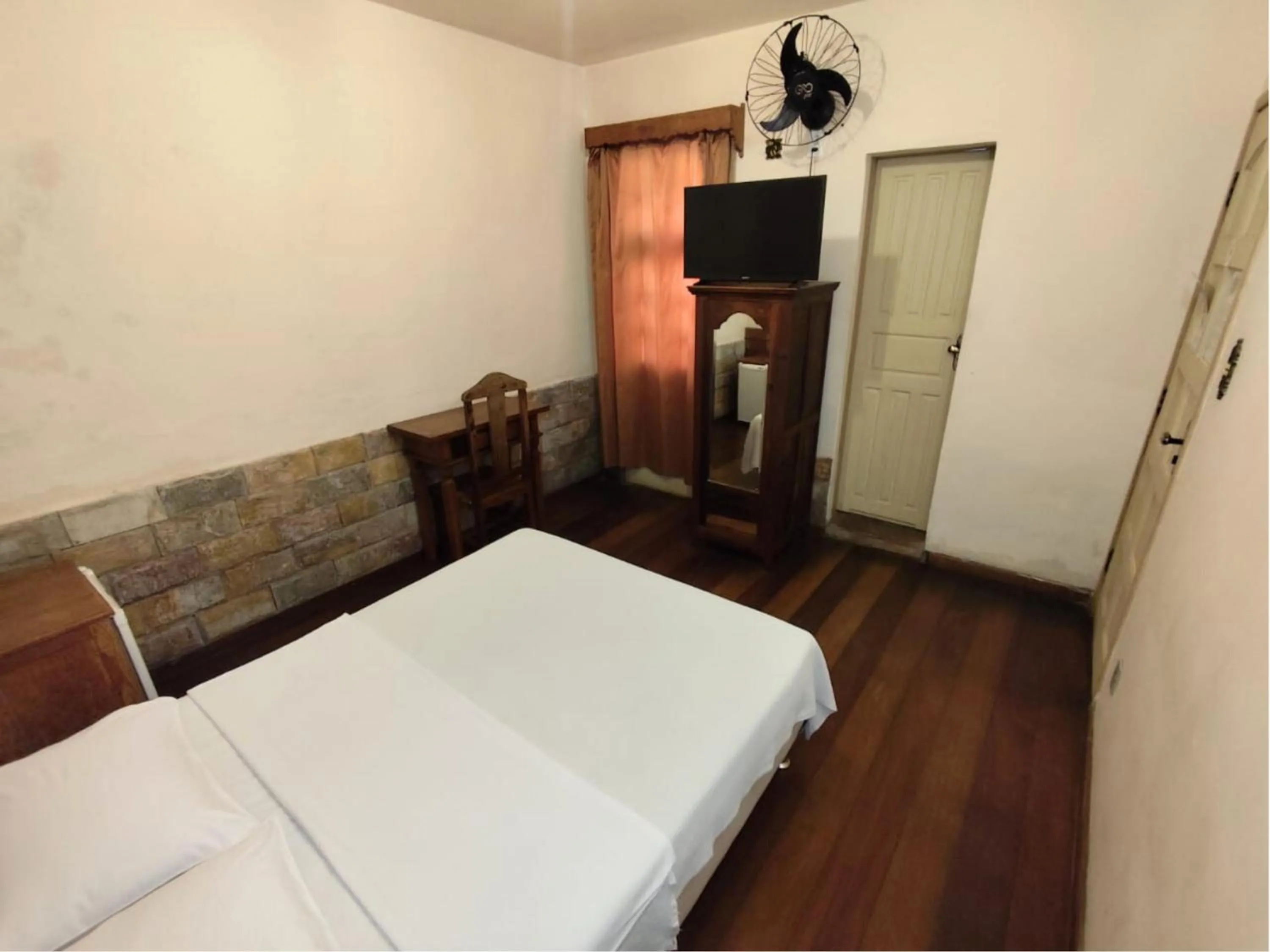Bed in Pousada Geraes