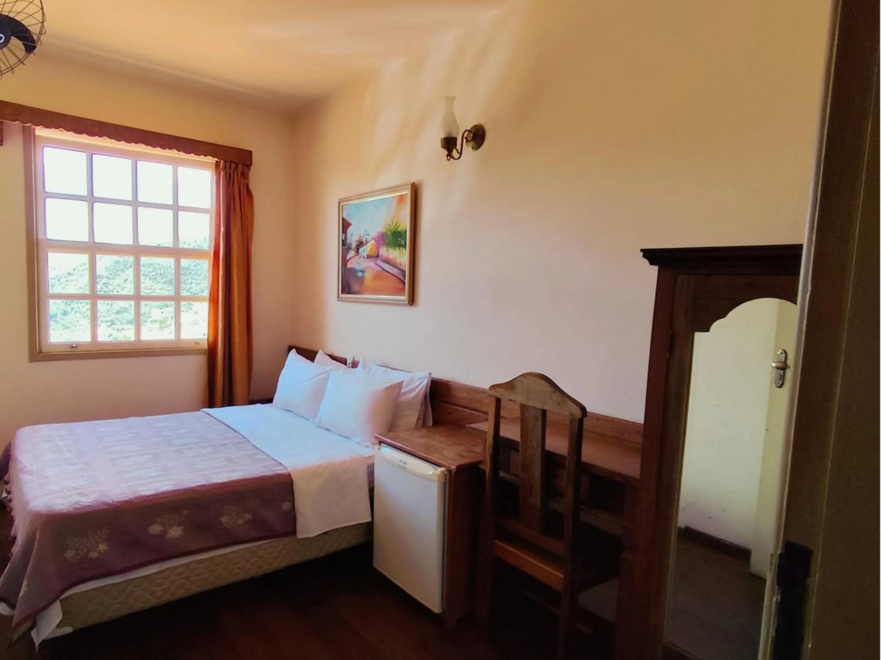 Bed in Pousada Geraes