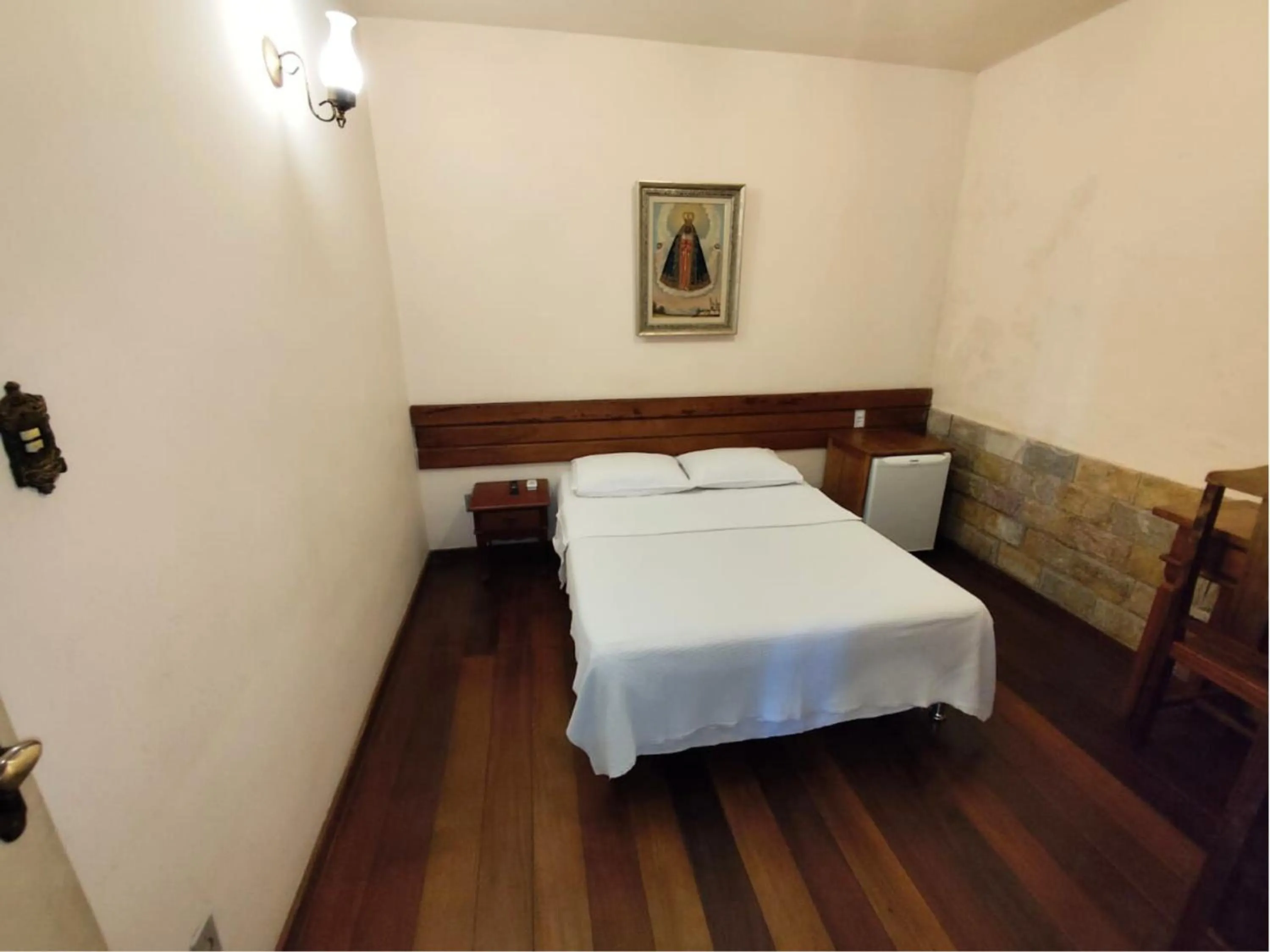 Bed in Pousada Geraes