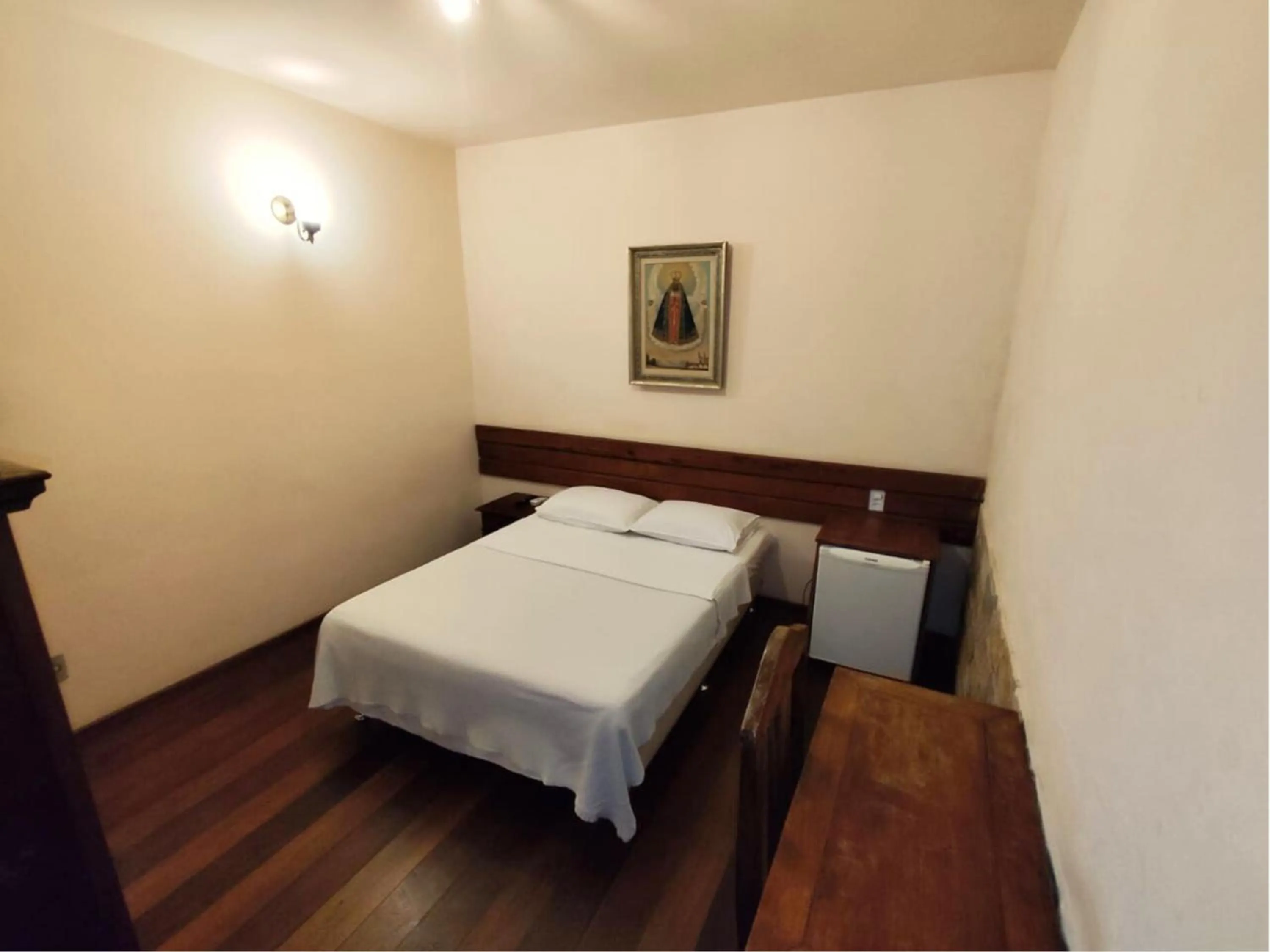 Bed in Pousada Geraes