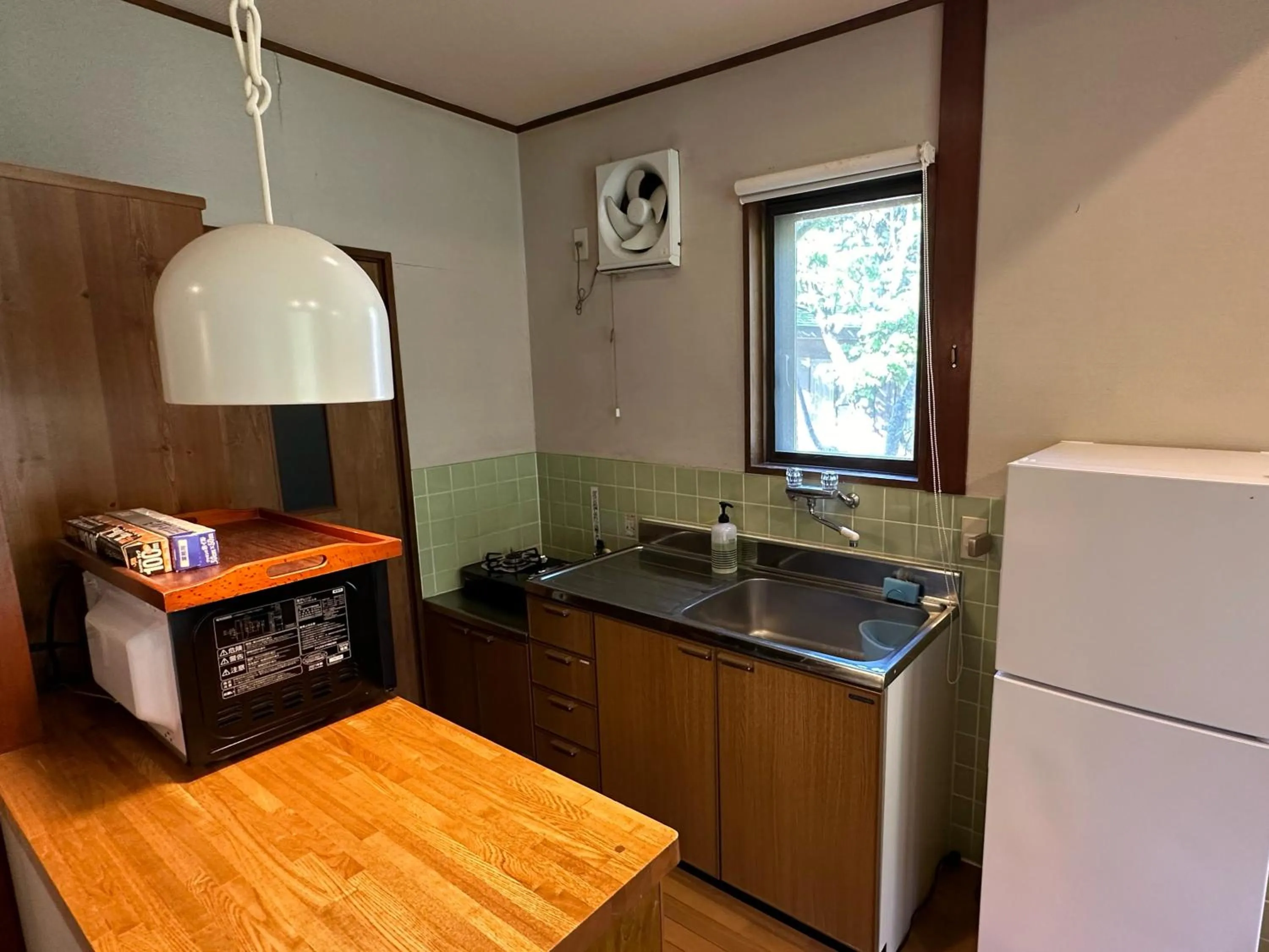 Kitchen or kitchenette in Nature Cottage Akabeko