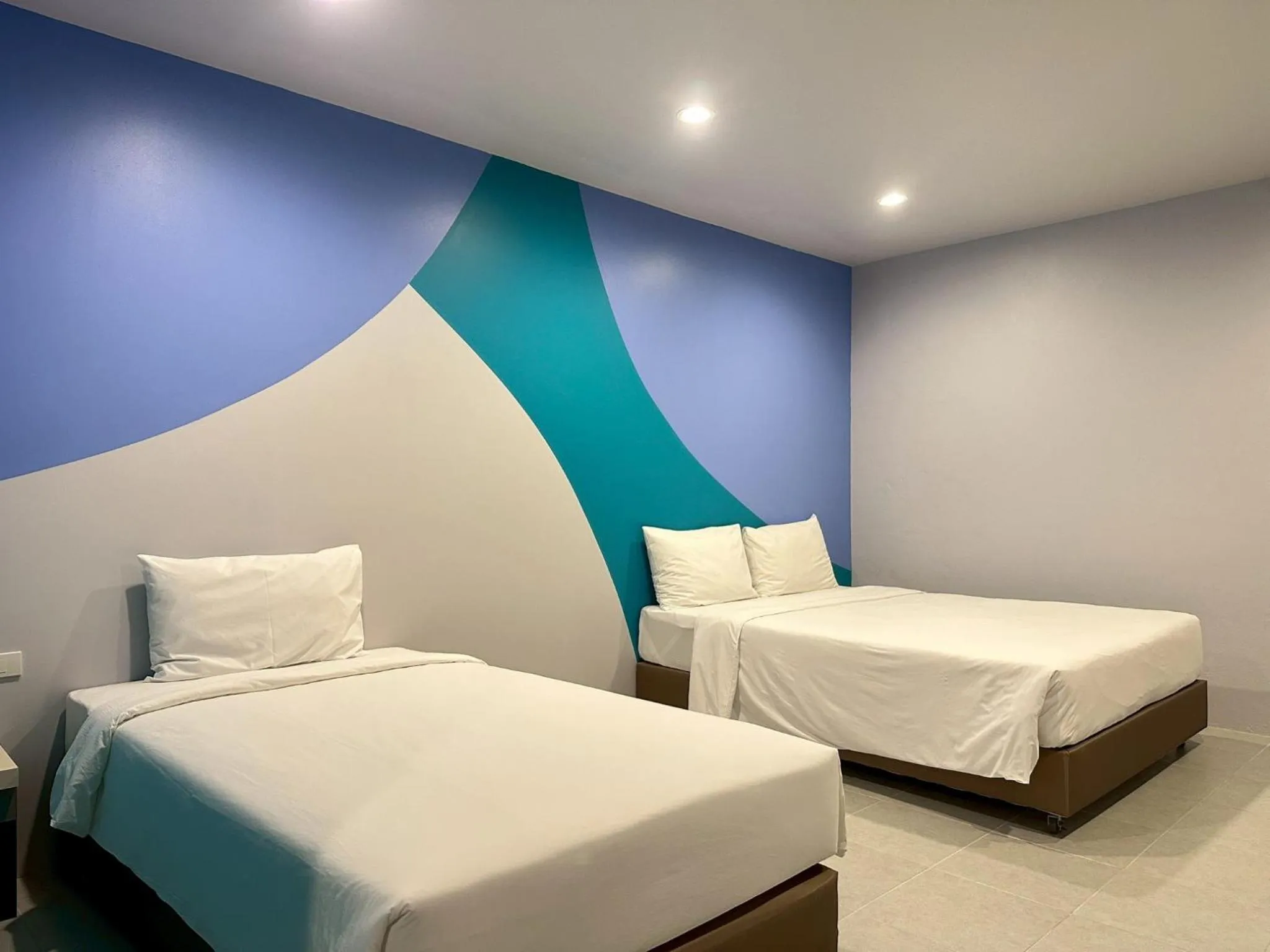 Bed in Siri Hotel Phuket