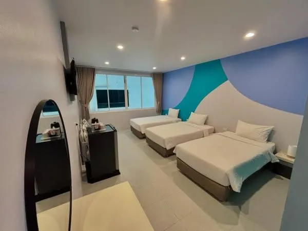 Bed in Siri Hotel Phuket