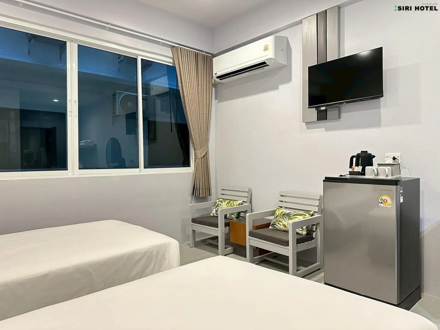 Bed in Siri Hotel Phuket