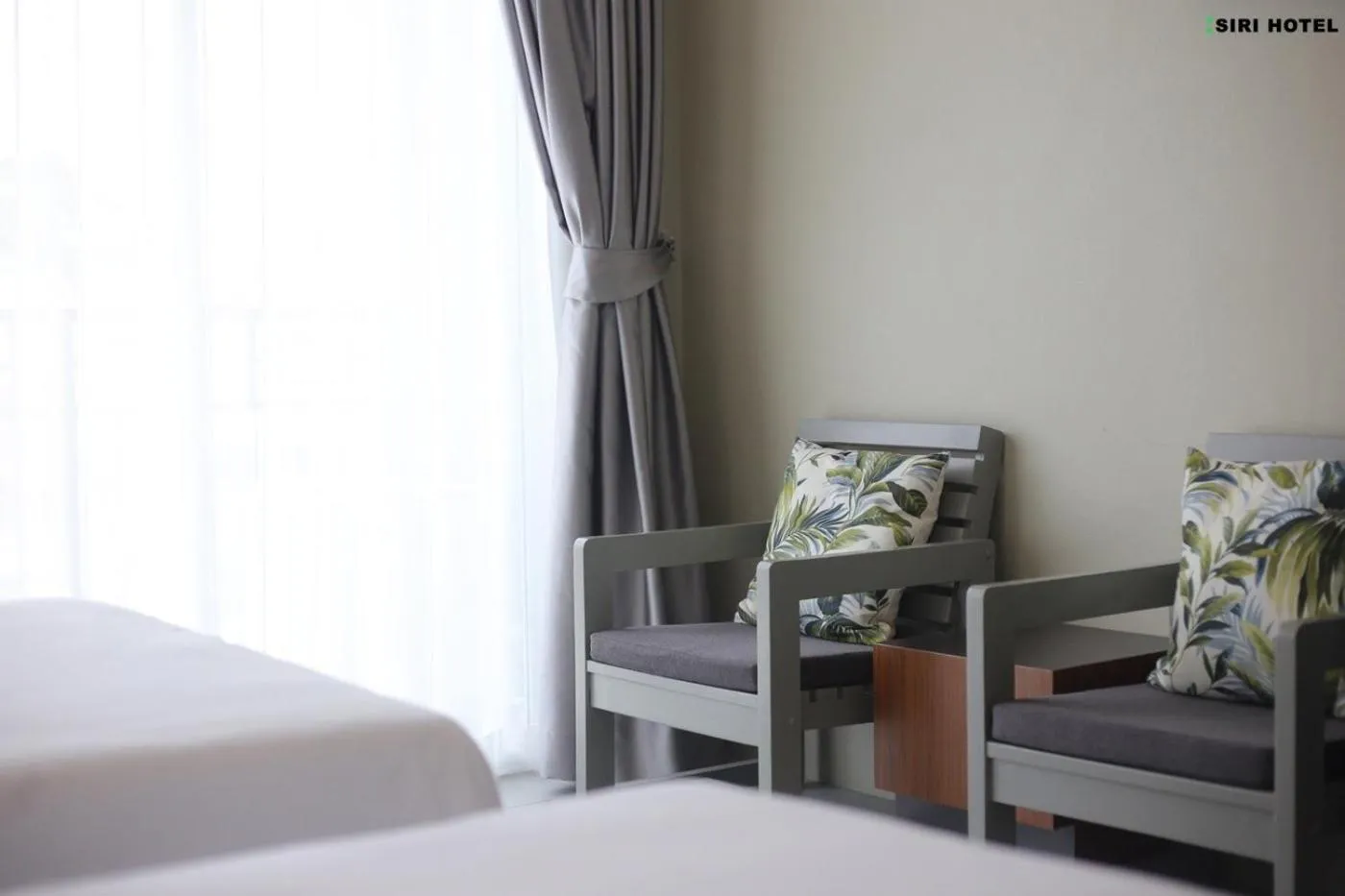 Photo of the whole room, Bed in Siri Hotel Phuket