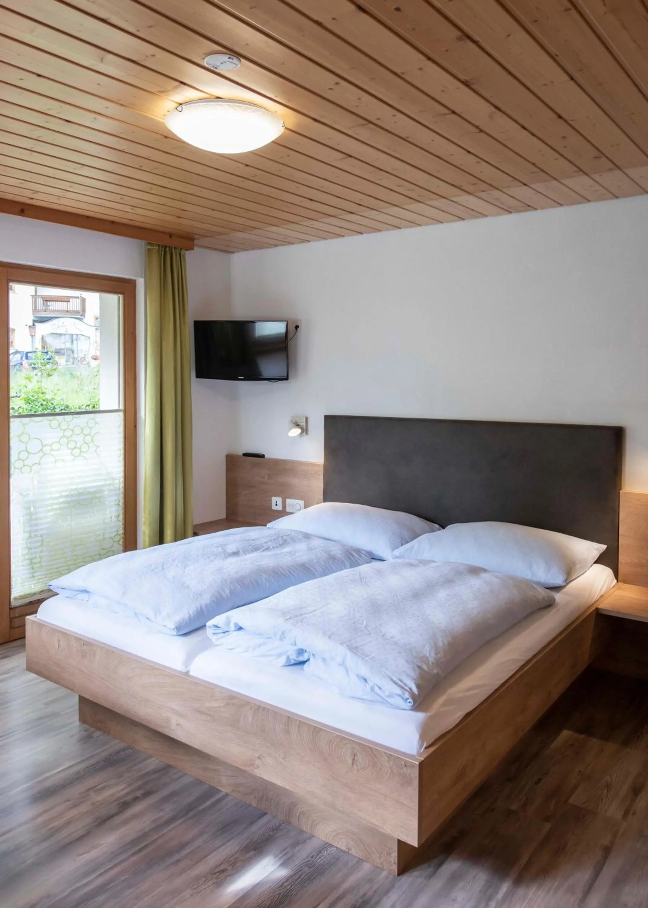Bed in Apartment Madlaina