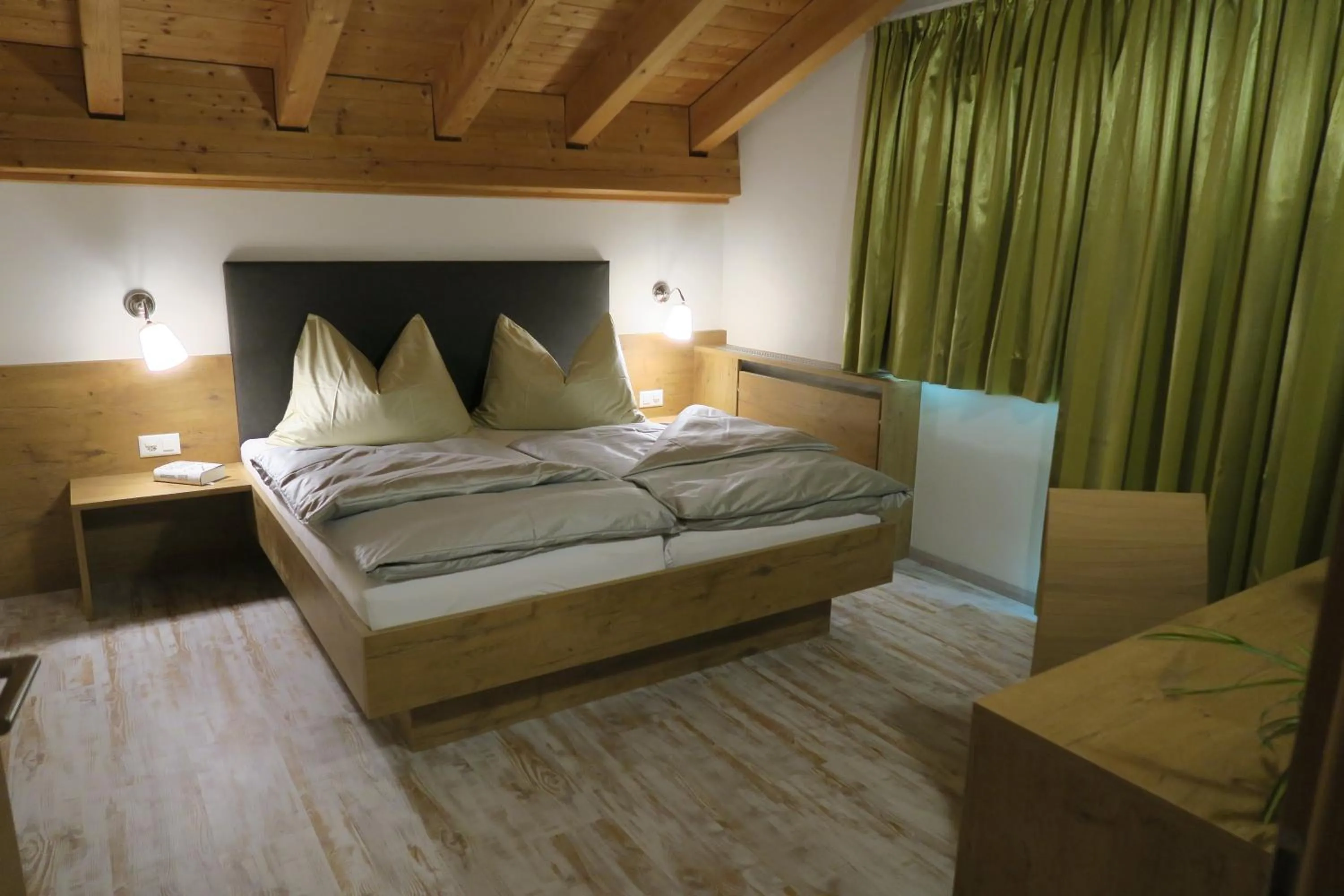 Bed in Apartment Madlaina