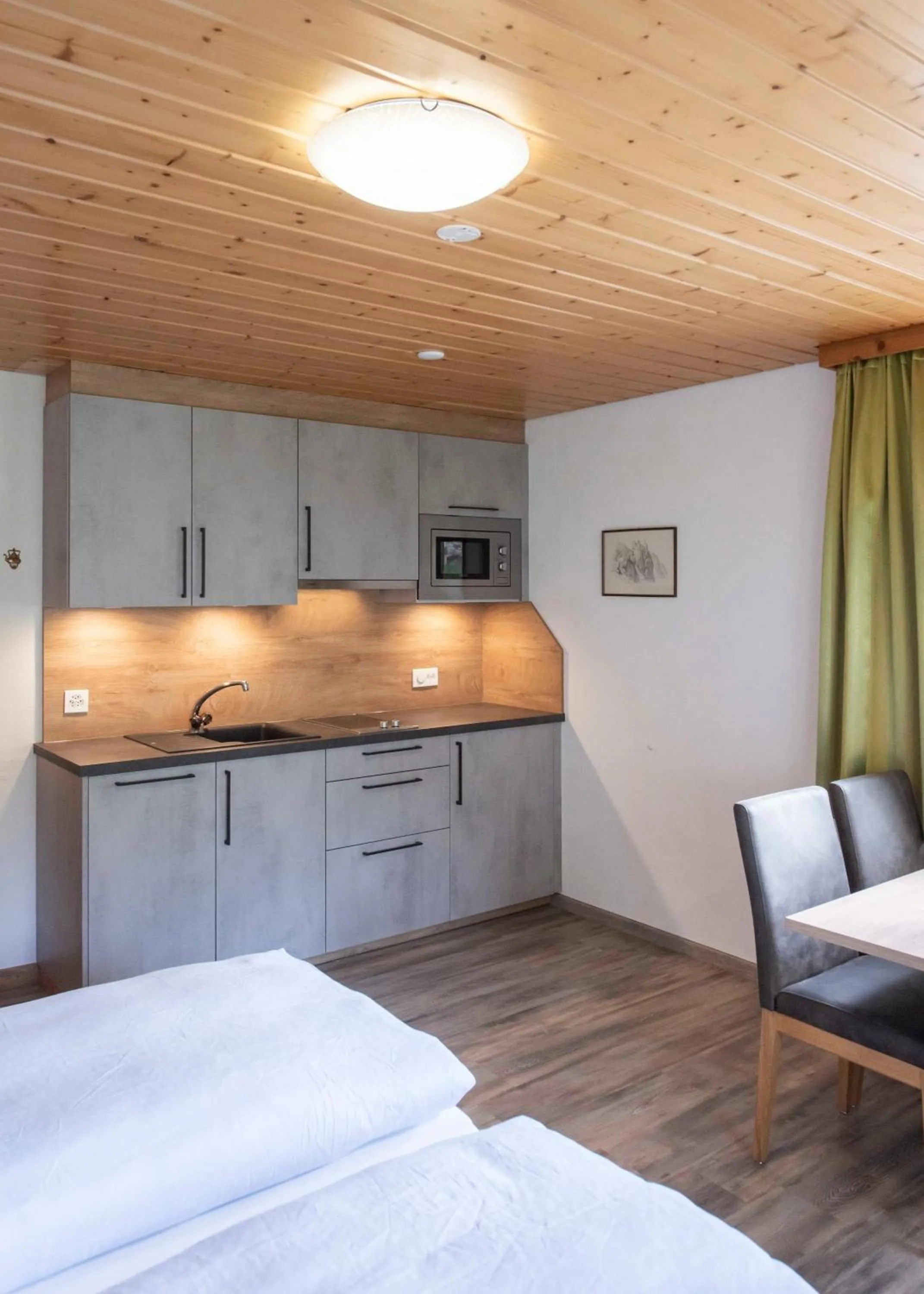 Kitchen or kitchenette, Bed in Apartment Madlaina