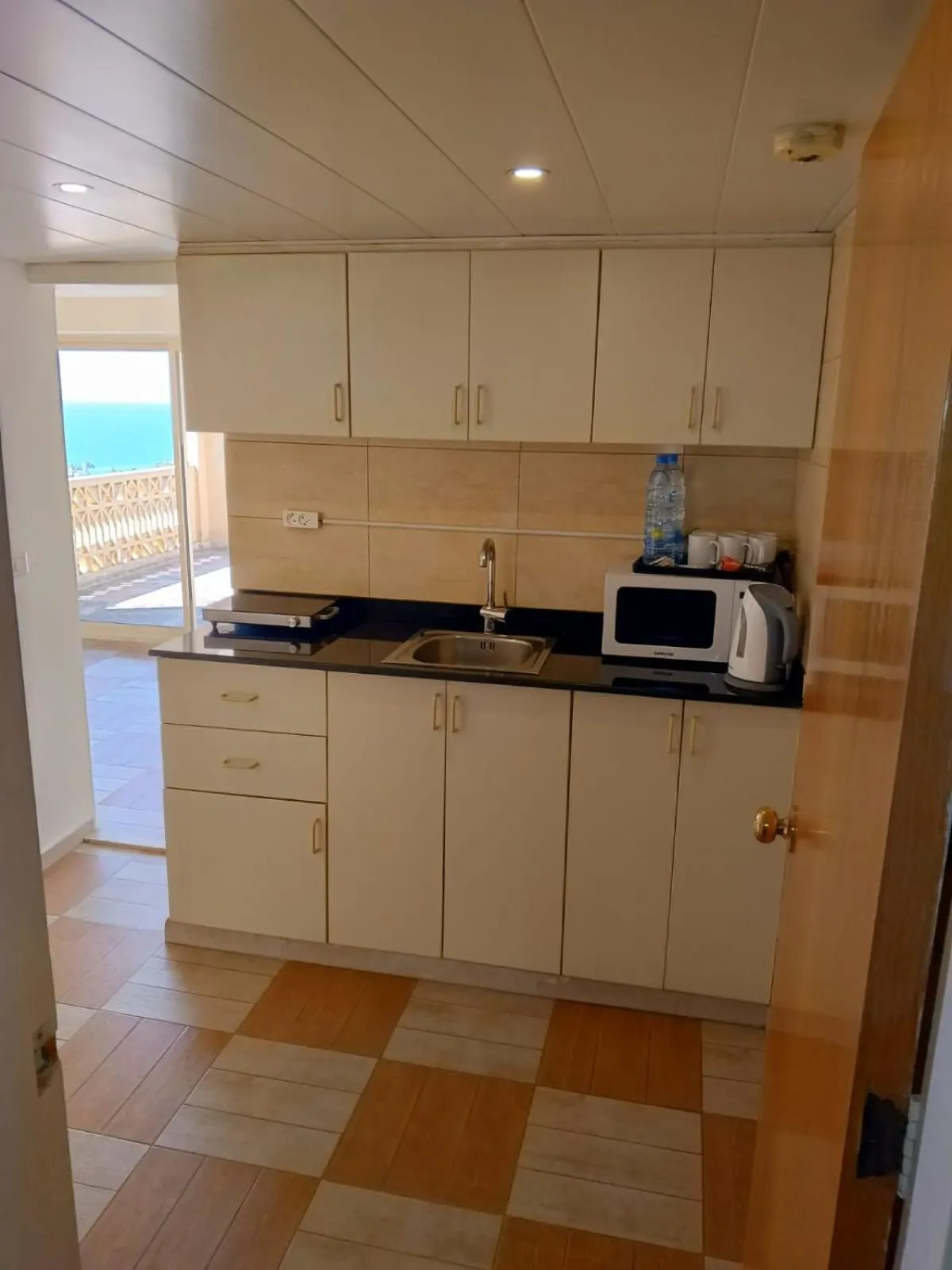 Kitchen or kitchenette in Manara Riva Suites
