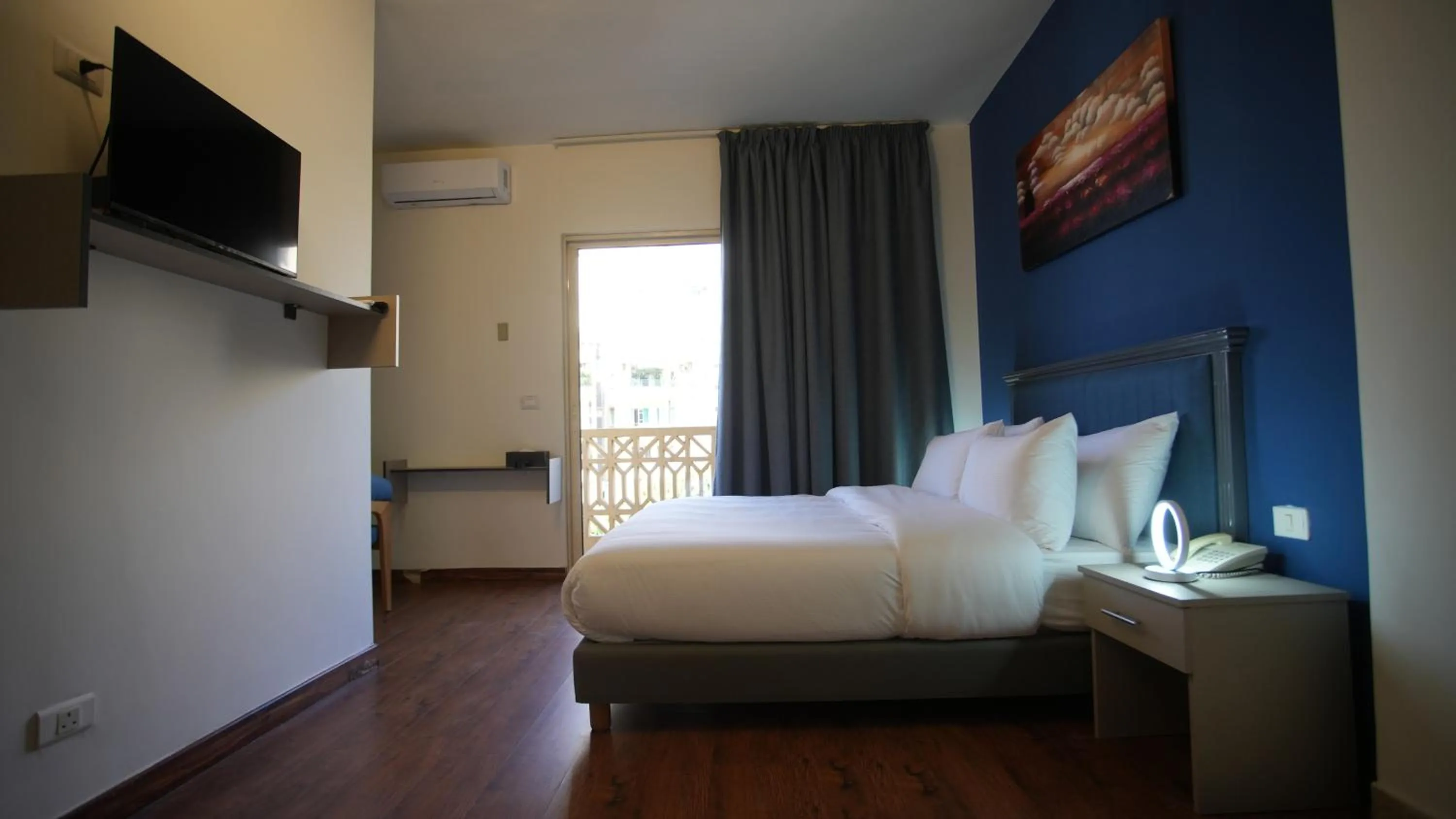 Bed in Manara Riva Suites