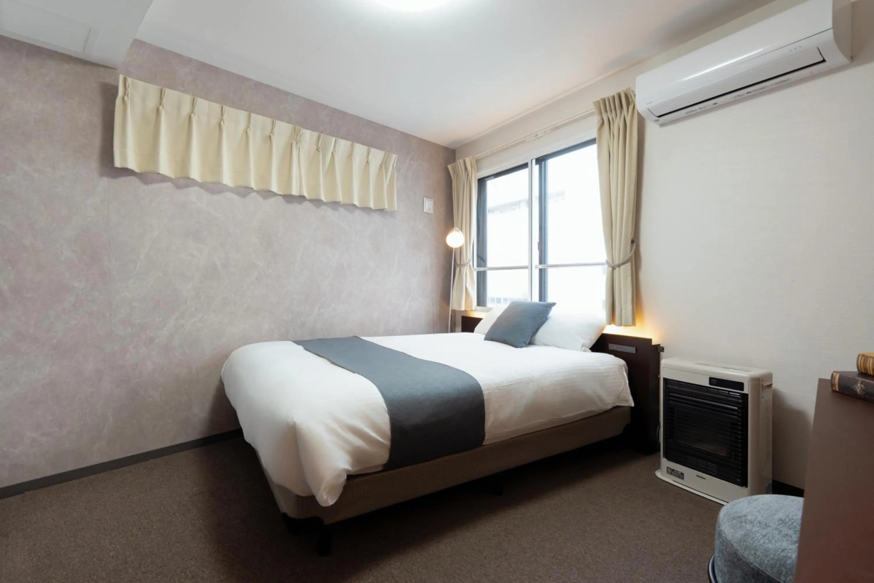 Bed in Residence Hotel Sapporo Susukino