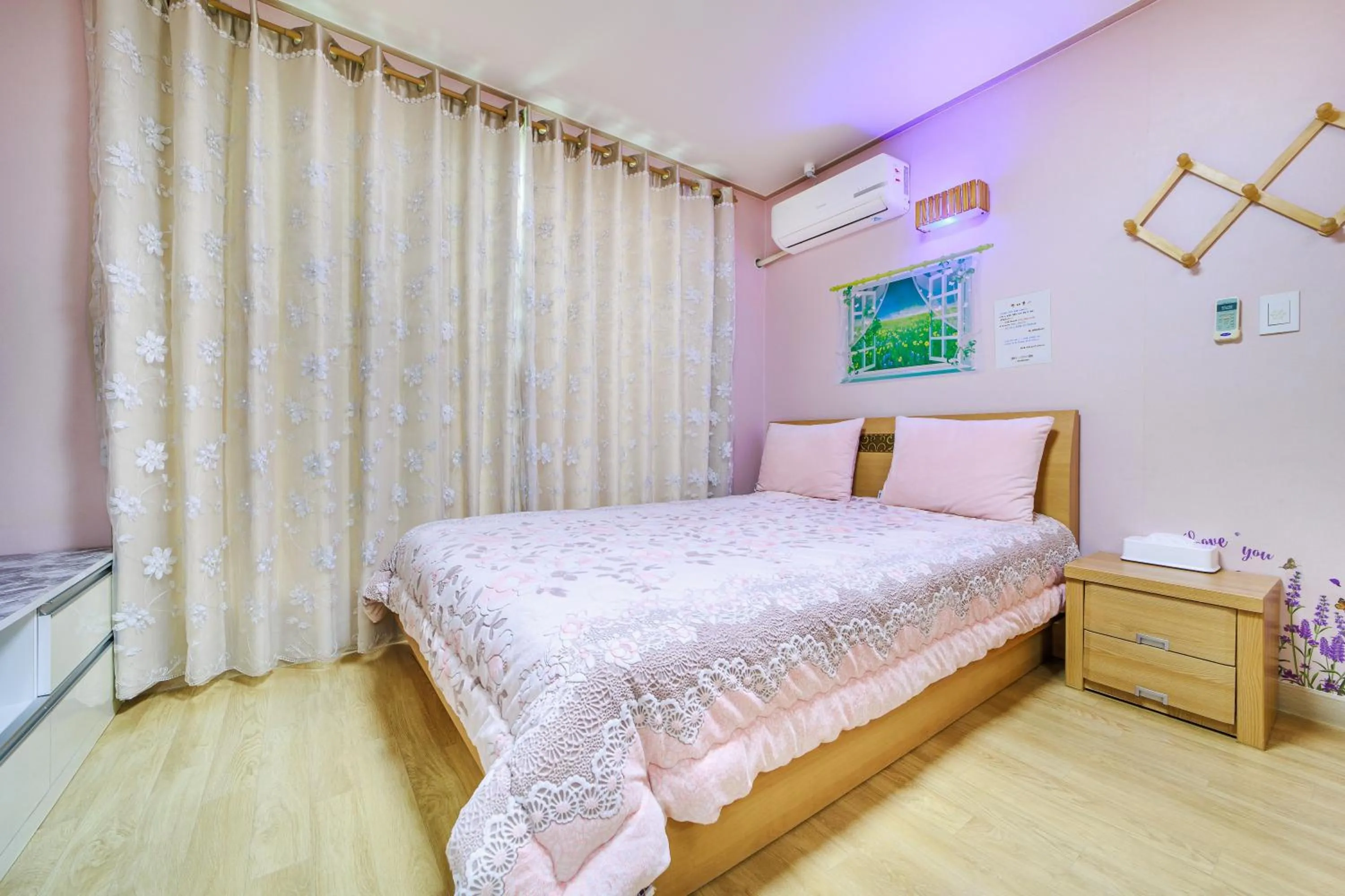 Bed in Sokcho Santolini Pension