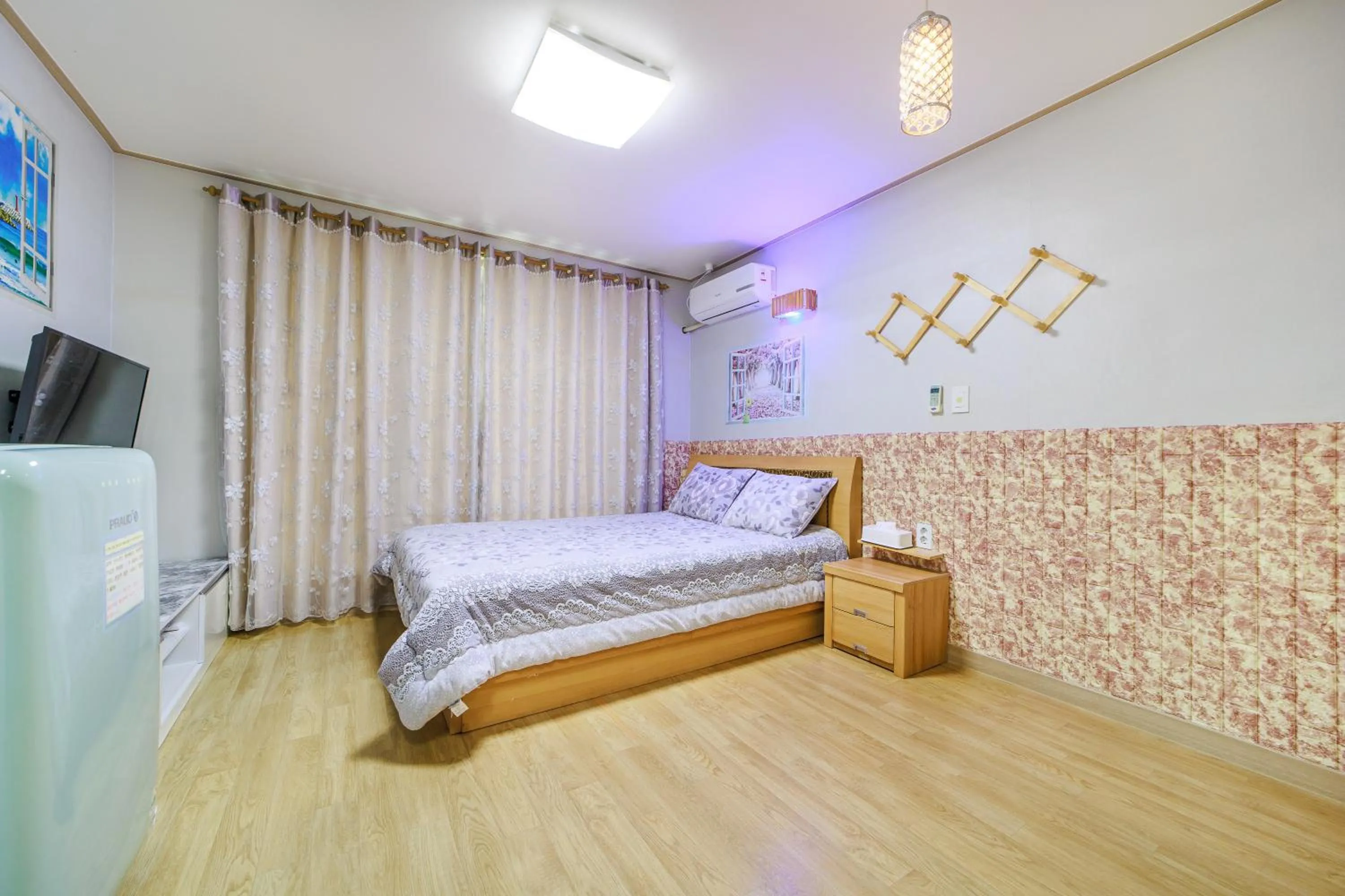 Bed in Sokcho Santolini Pension